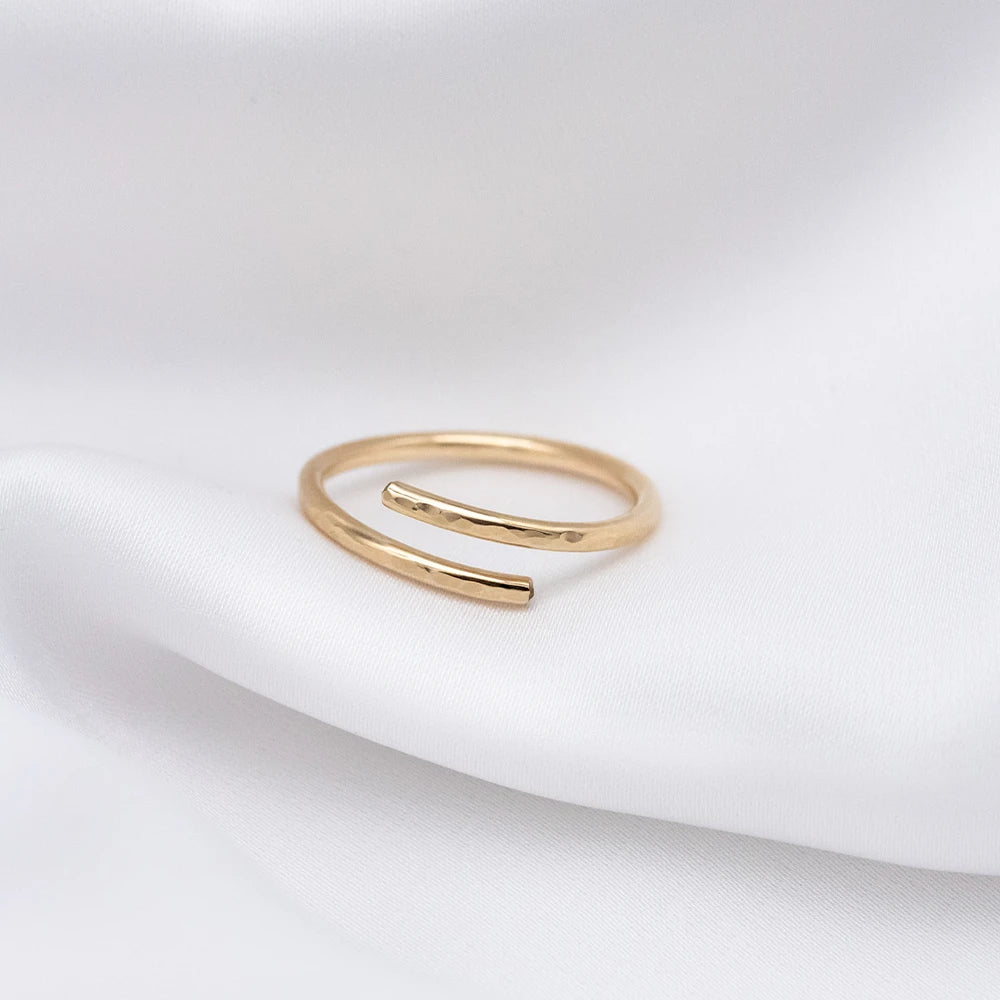 Intertwined Gold and Silver Hammered Rings