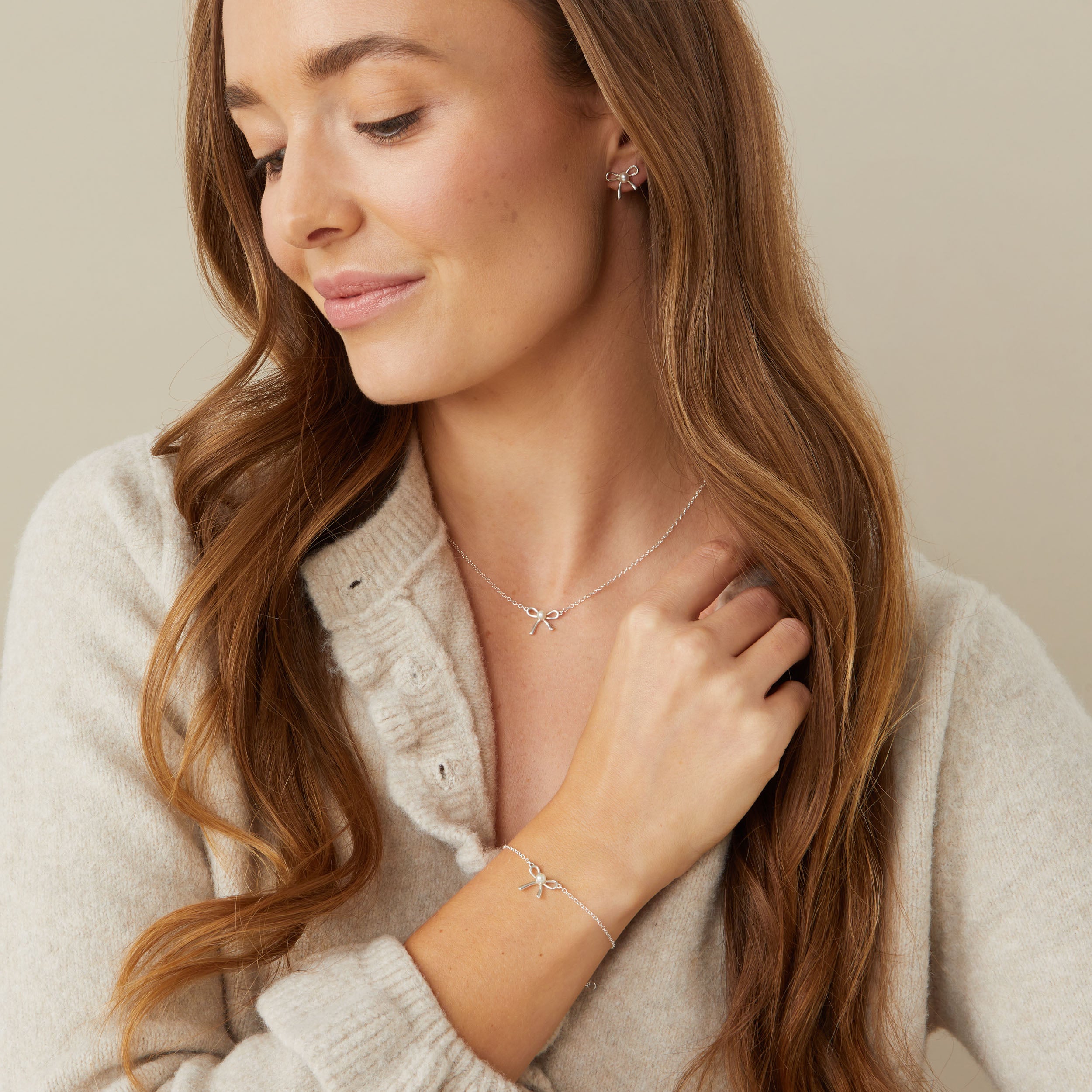 Pearl Bow Stud Earrings - Bonnie