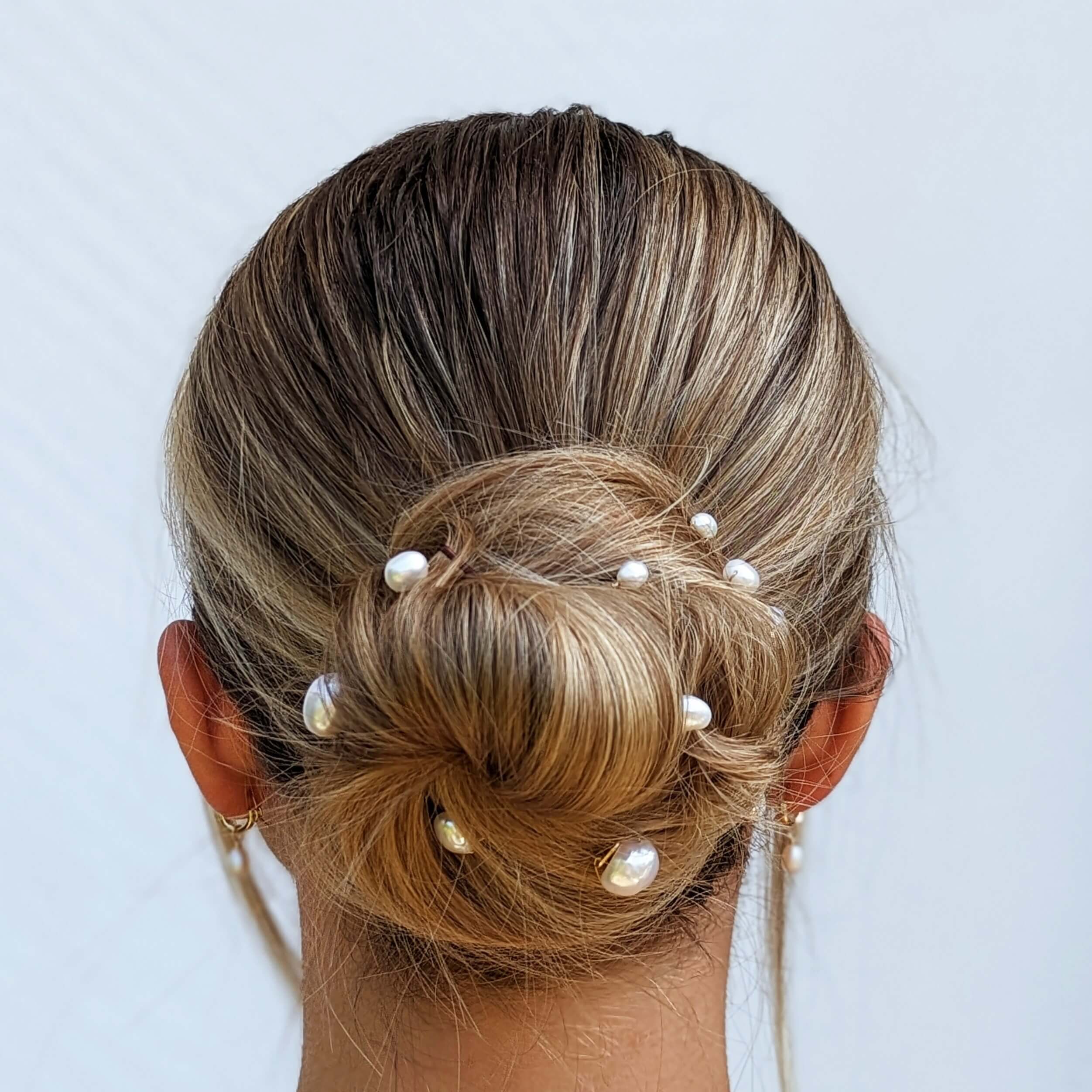 freshwater pearl hair pin set in hair on bride