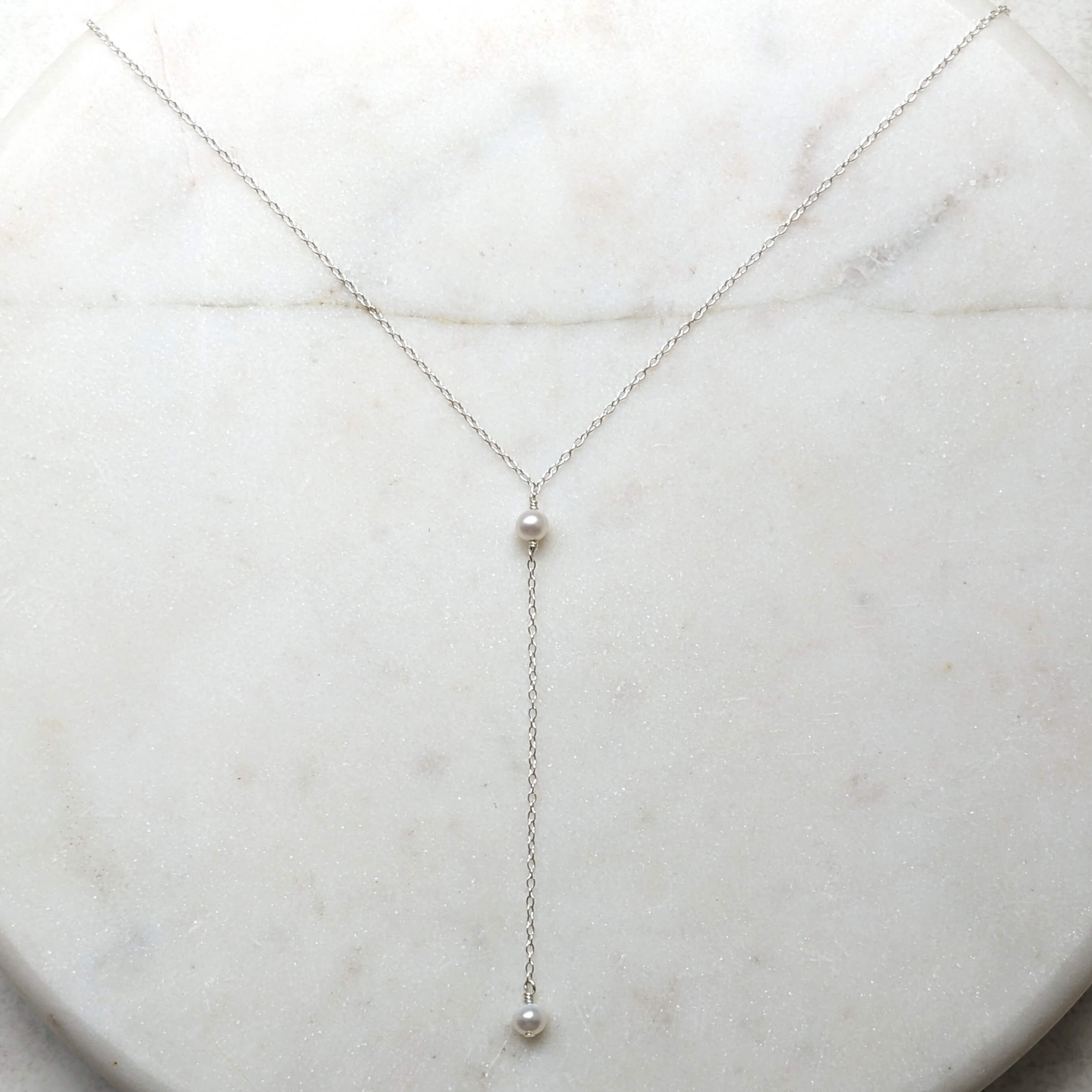 sterling silver pearl chain necklace flatlay