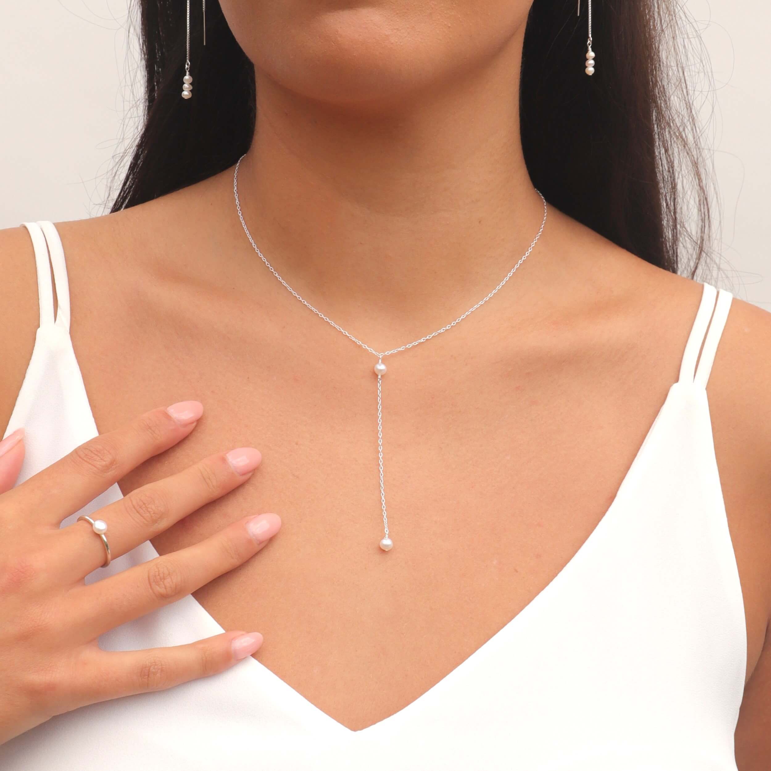 pearl lariat necklace in sterling silver on model