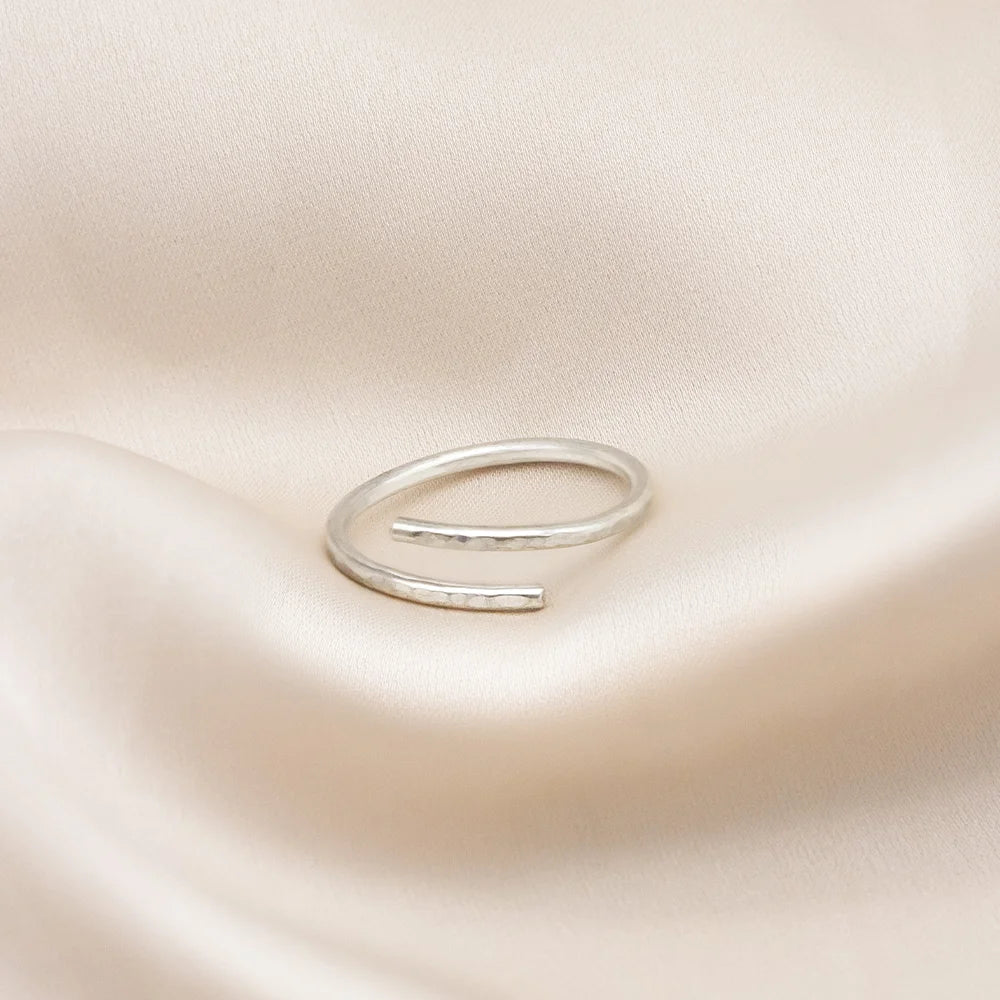 Intertwined Gold and Silver Hammered Rings