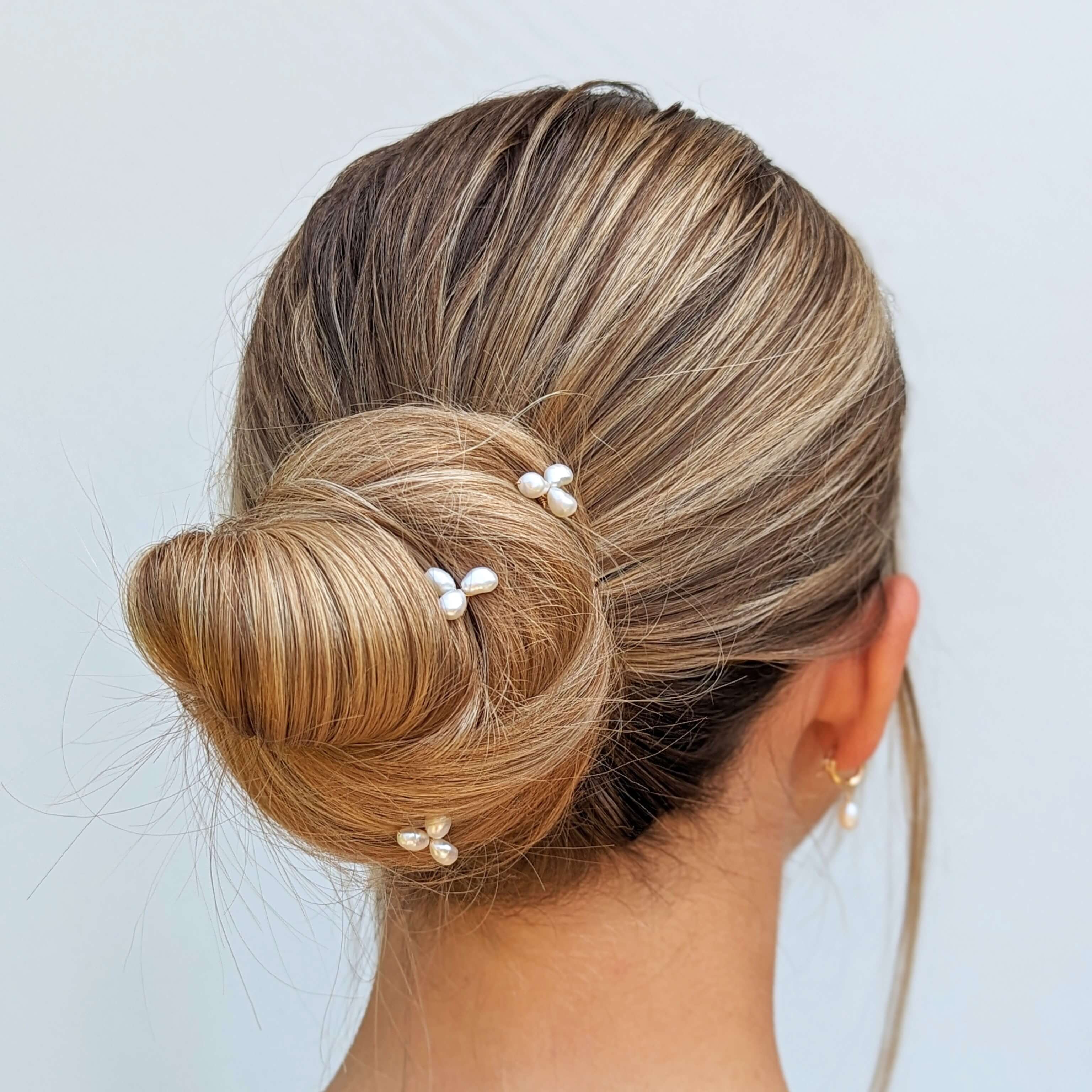 small pearl cluster hair pins on bride