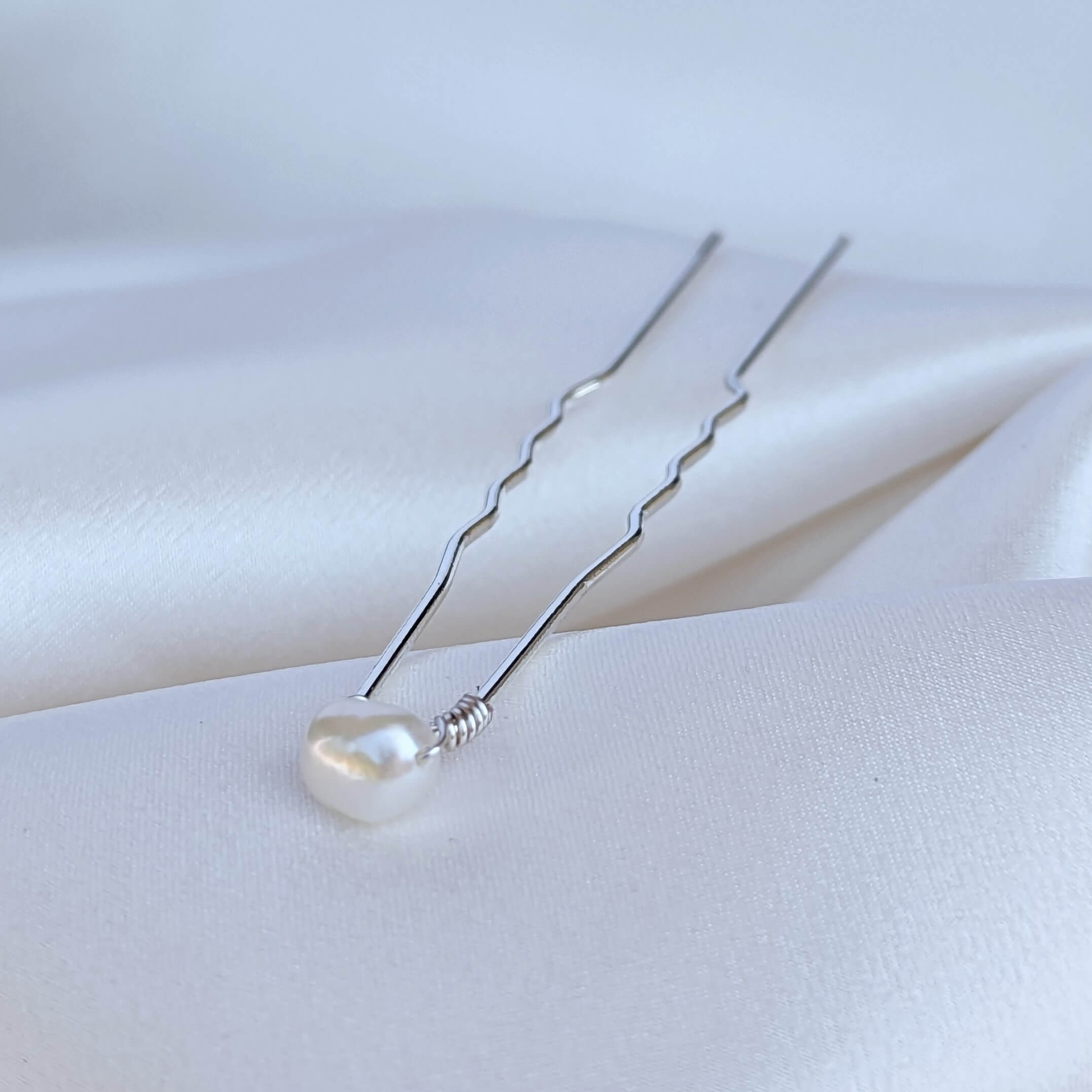 single small pearl hair pin in silver