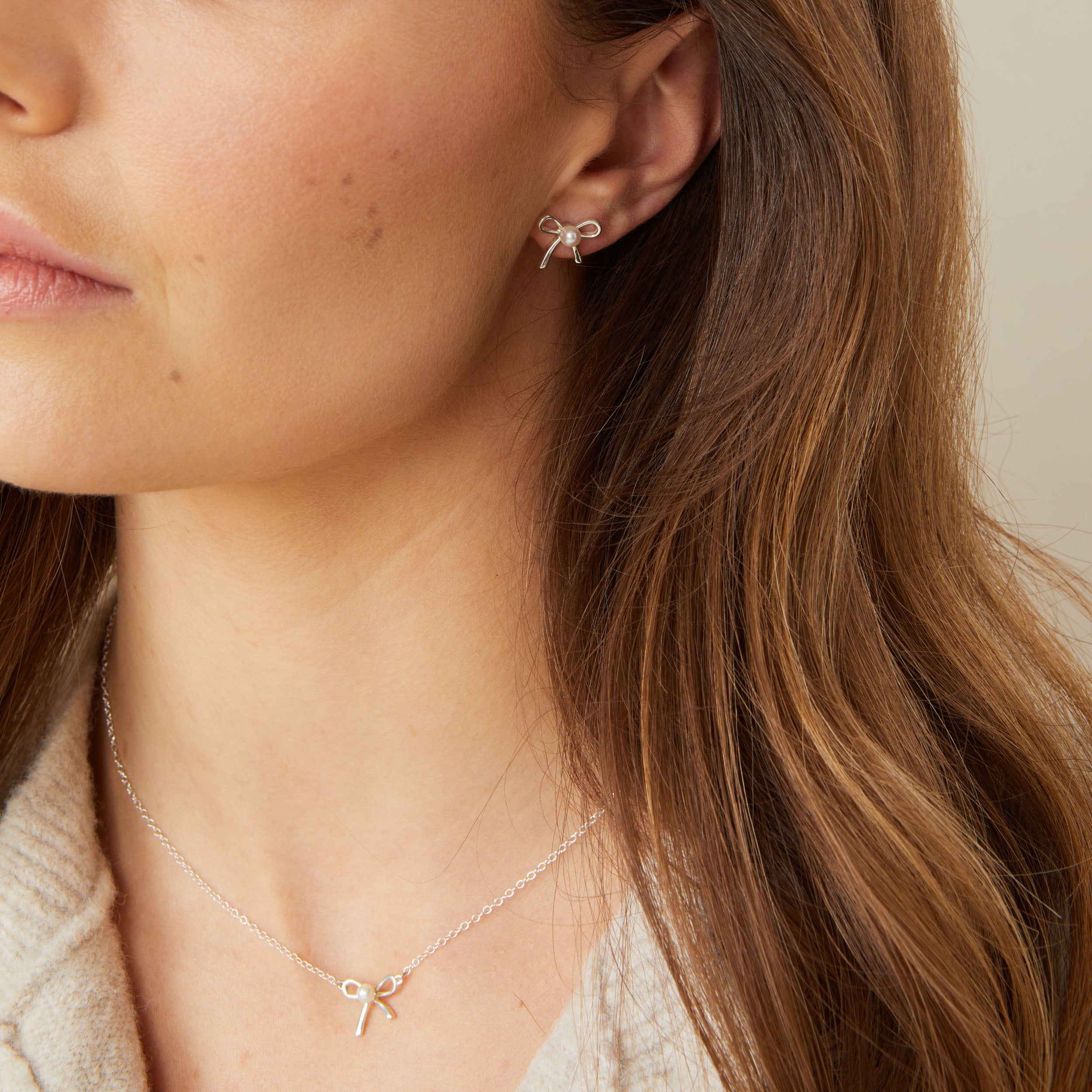 Pearl Bow Stud Earrings - Bonnie