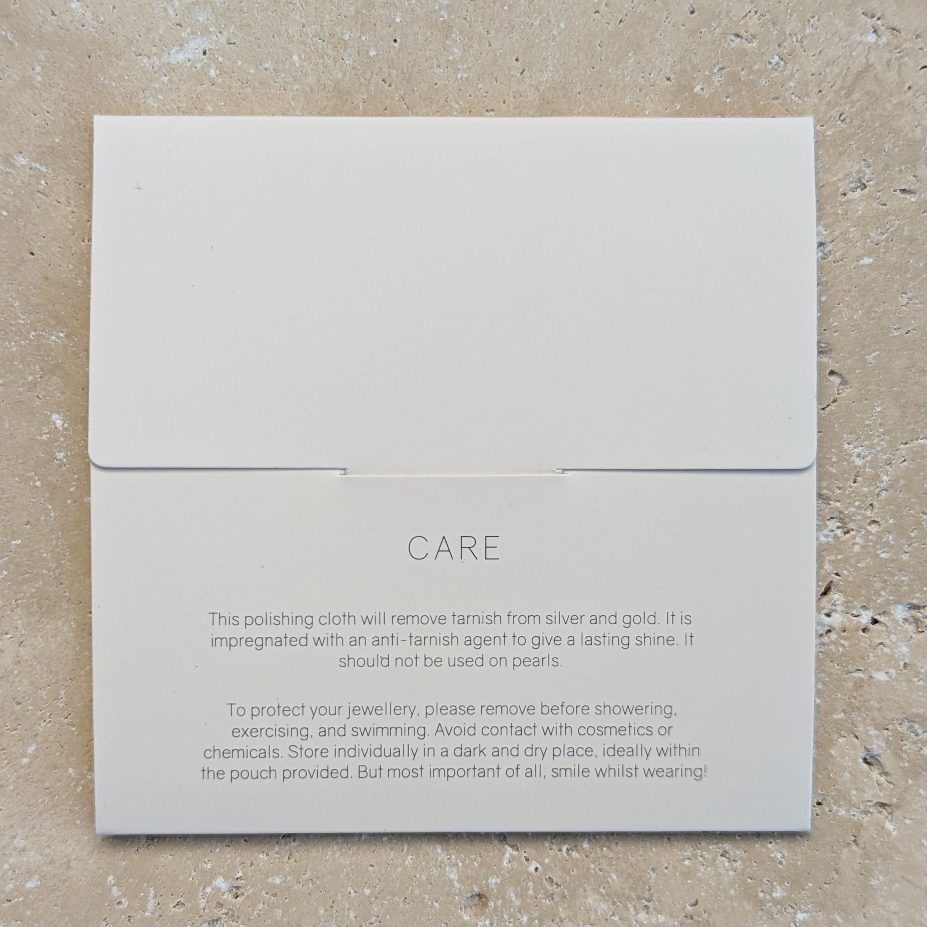 Back of envelope of jewellery polishing cloth