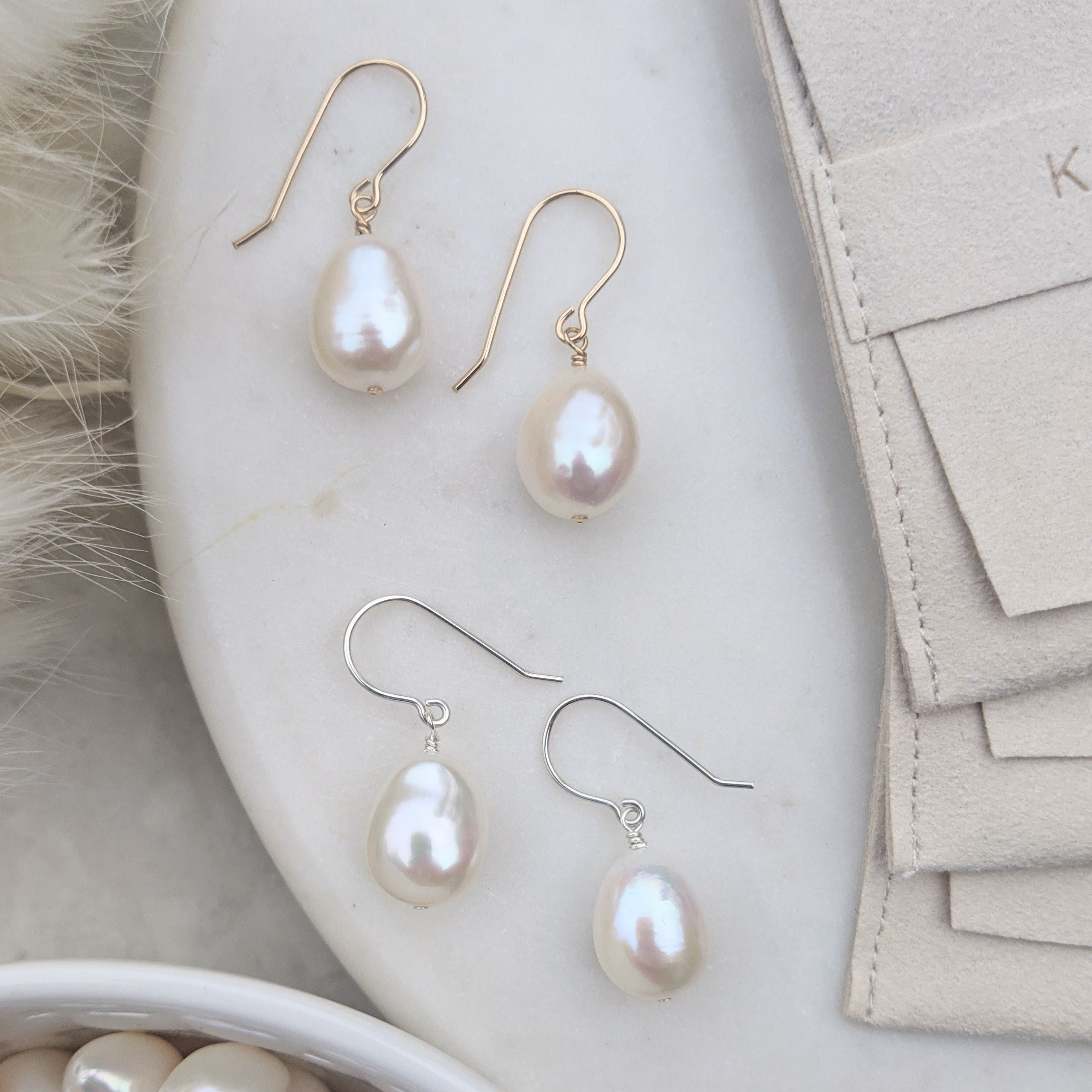 pearl hook earrings in both gold and sterling silver