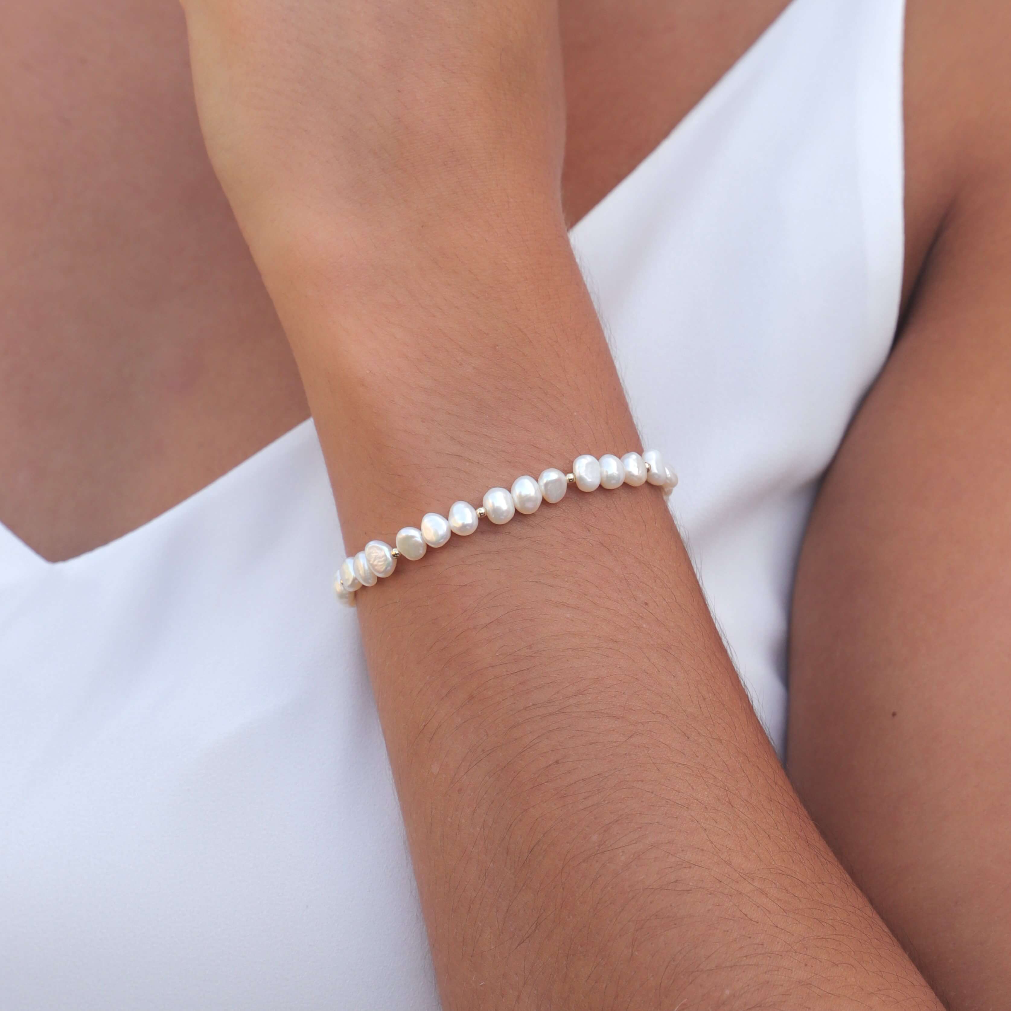 baroque pearl bead bracelet in gold filled close up on model wrist