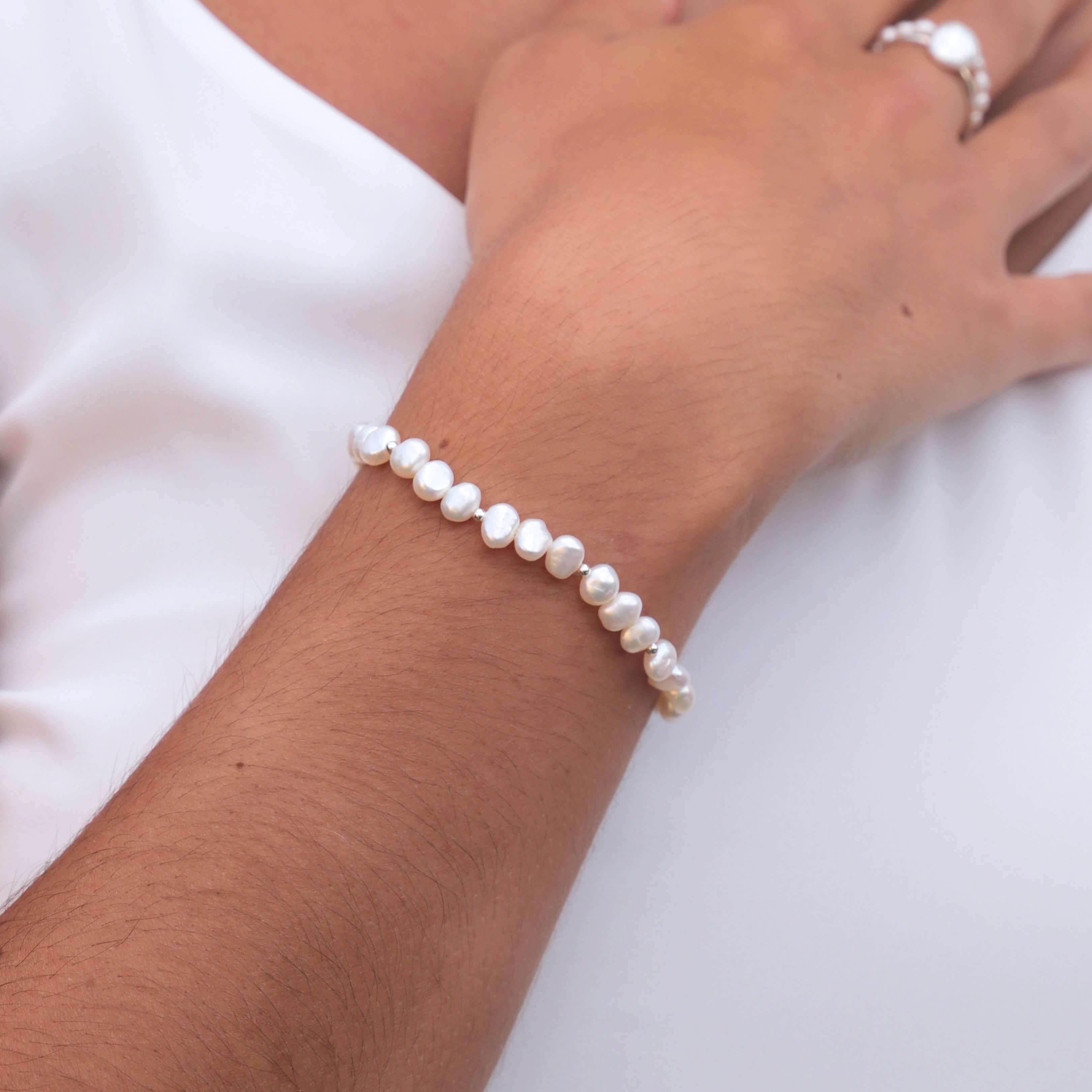 baroque pearl bead bracelet in sterling silver on model wrist close up