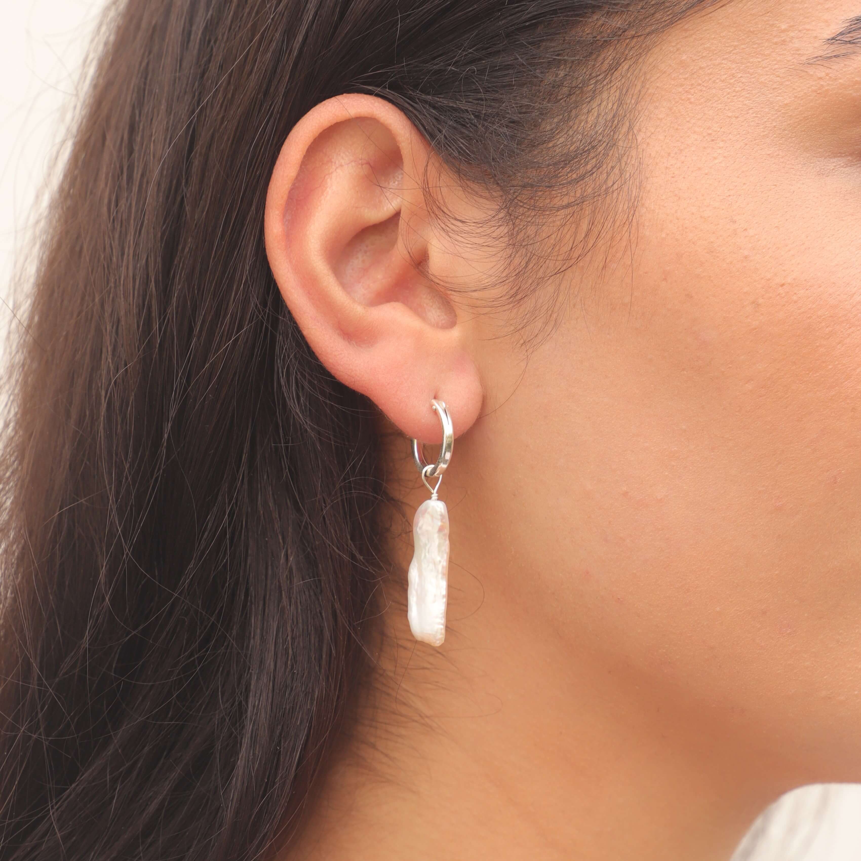 biwa pearl hoop earring in sterling silver on model close up