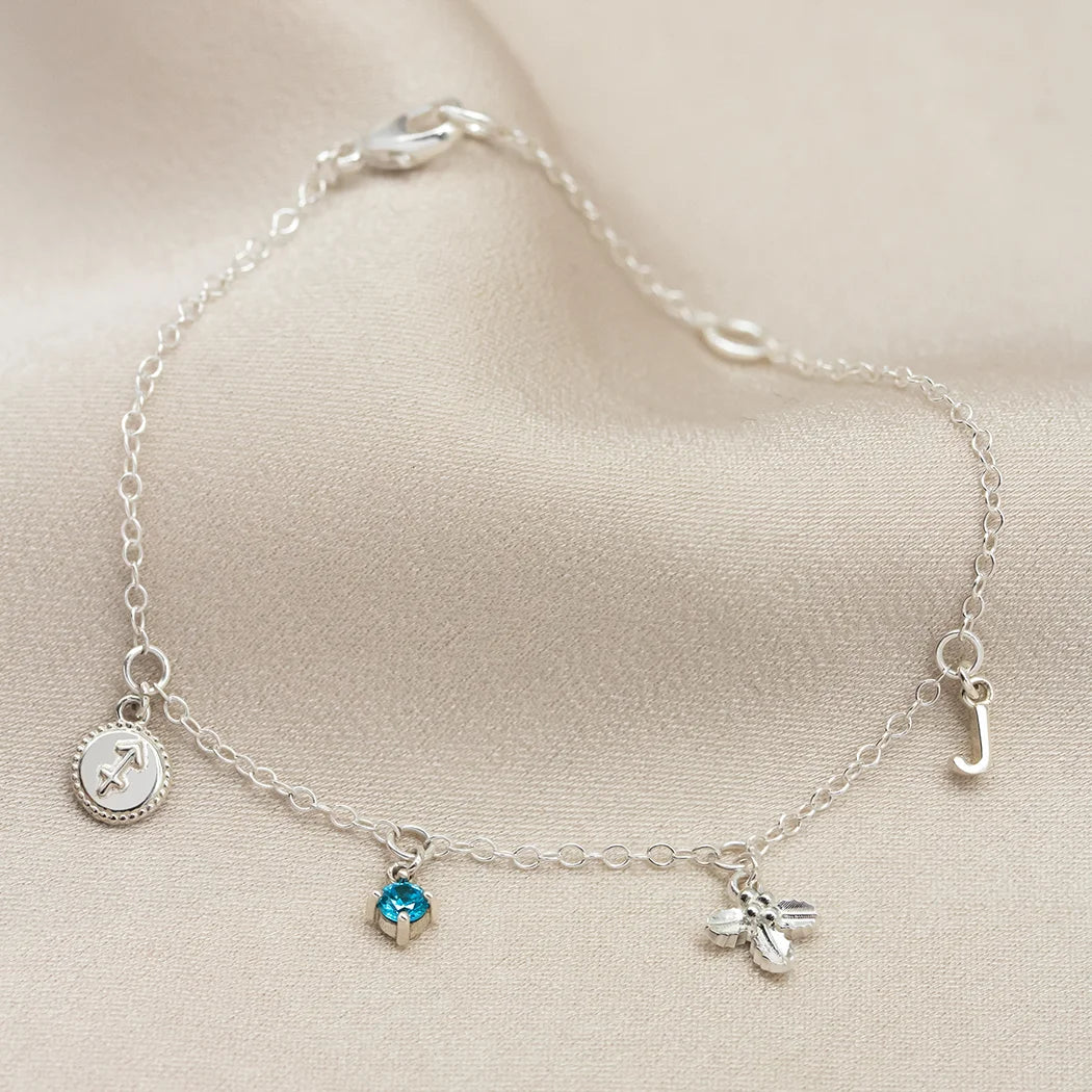 December Birthday Symbols Charm Bracelet