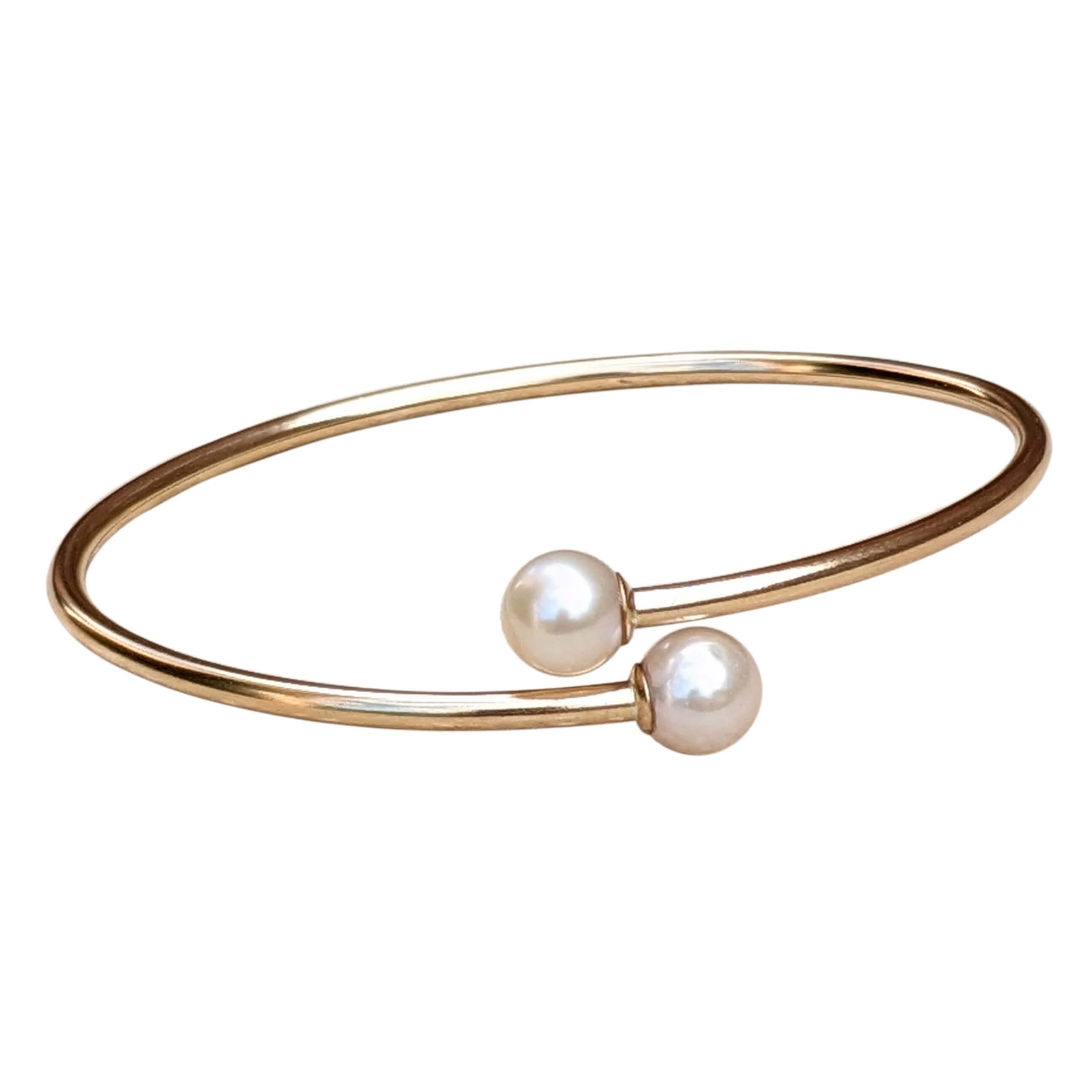 round pearl bangle in gold filled on a white background