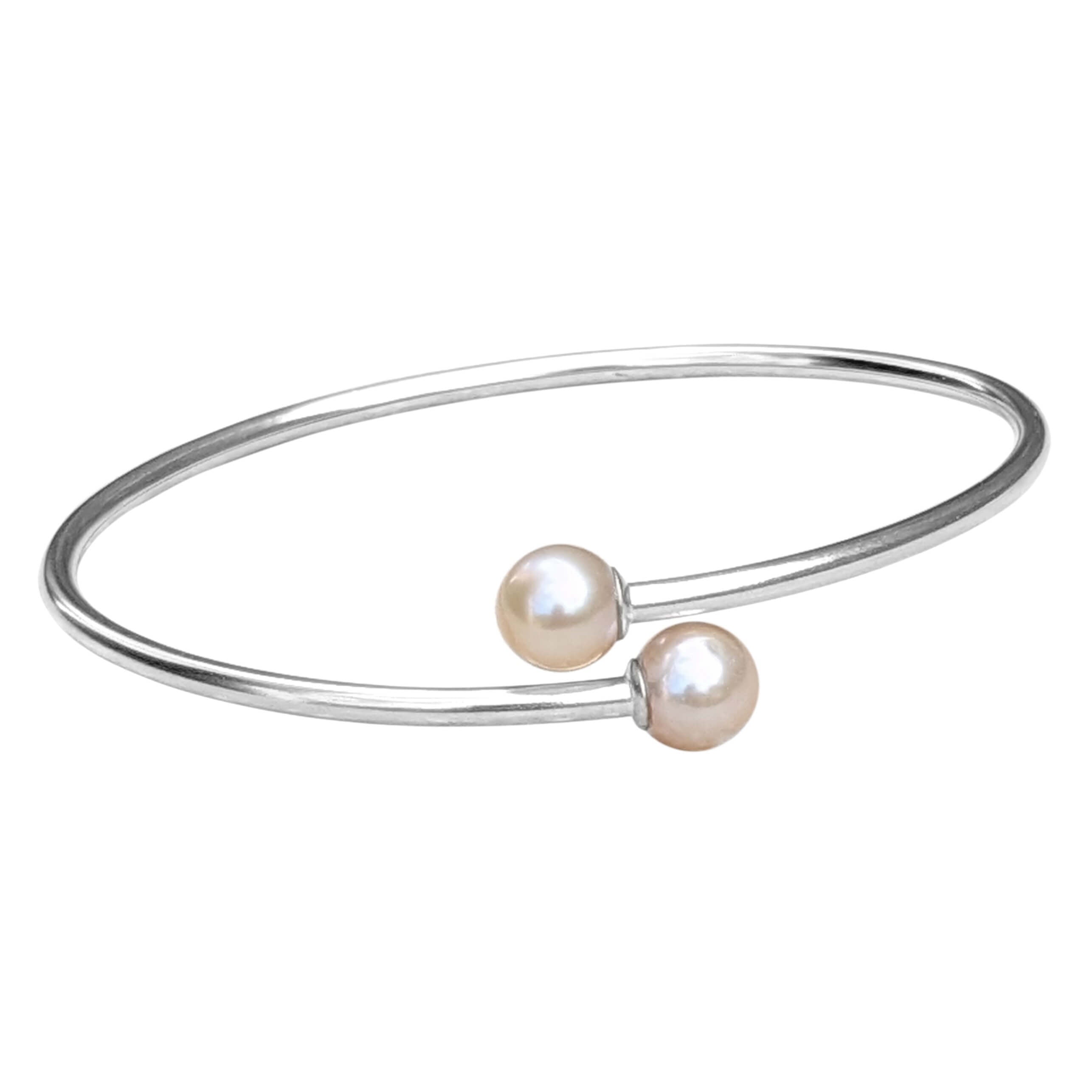 round pearl bangle in sterling silver on a white background