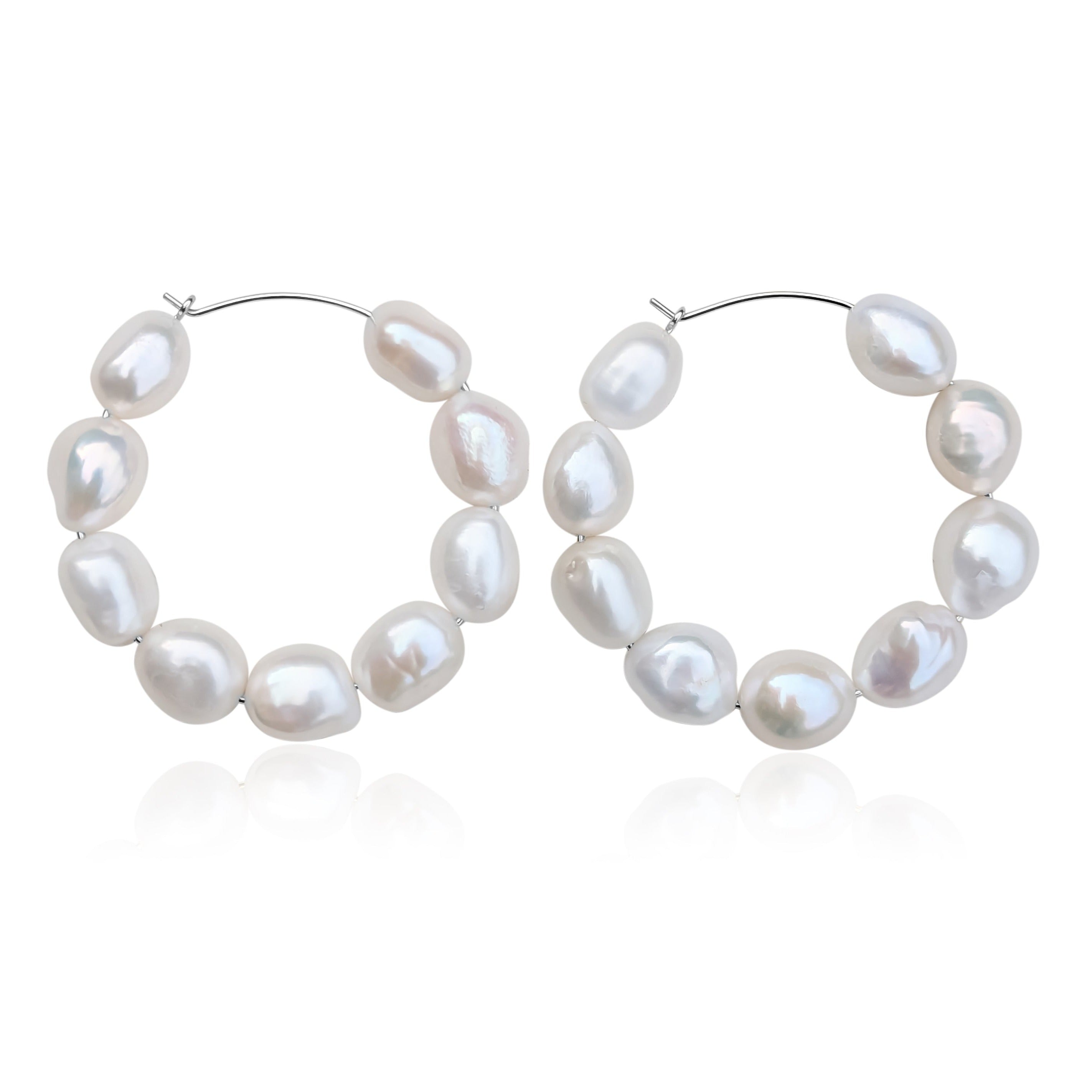 large pearl hoop earrings sterling silver white background