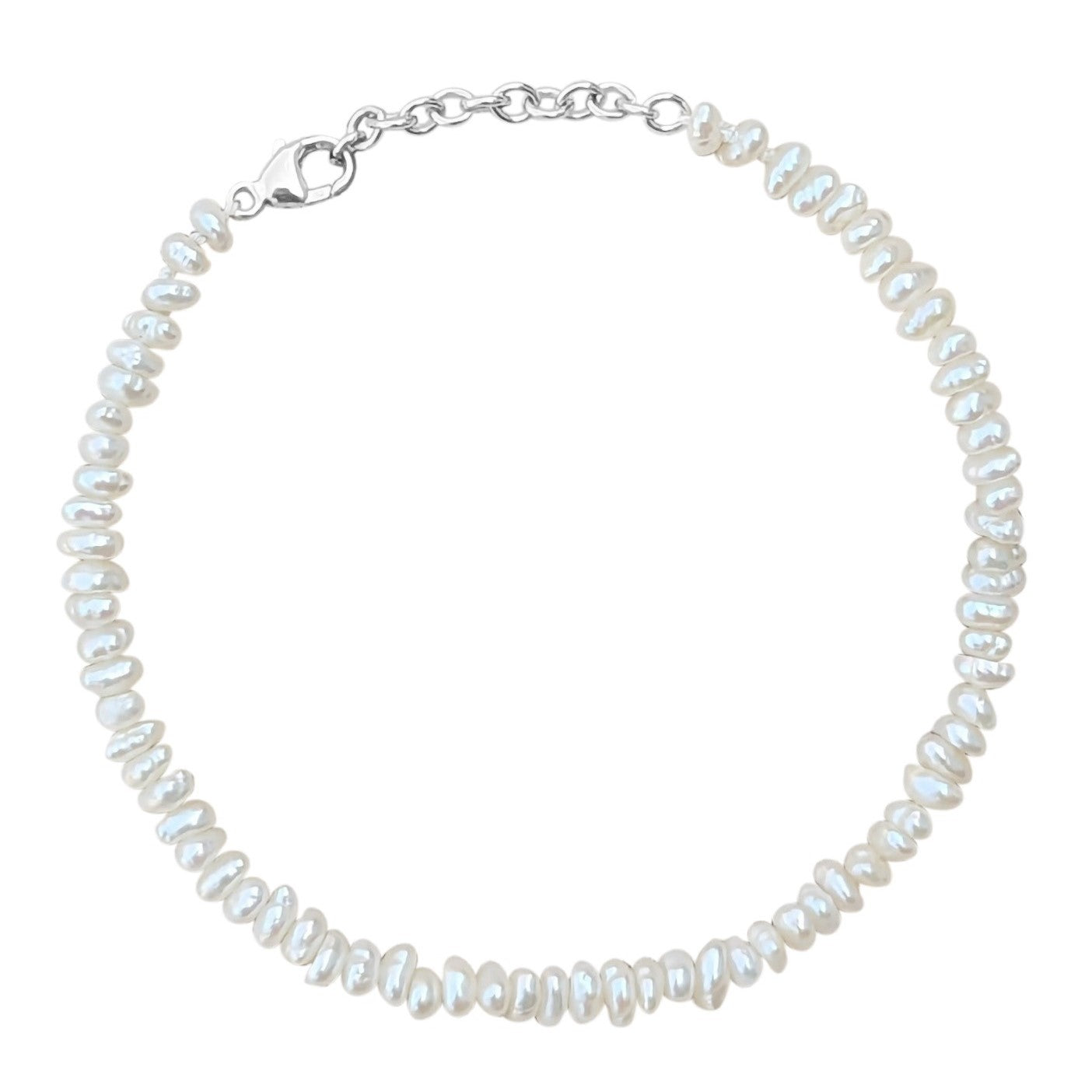 mini freshwater keshi pearl bracelet in sterling silver on a white background