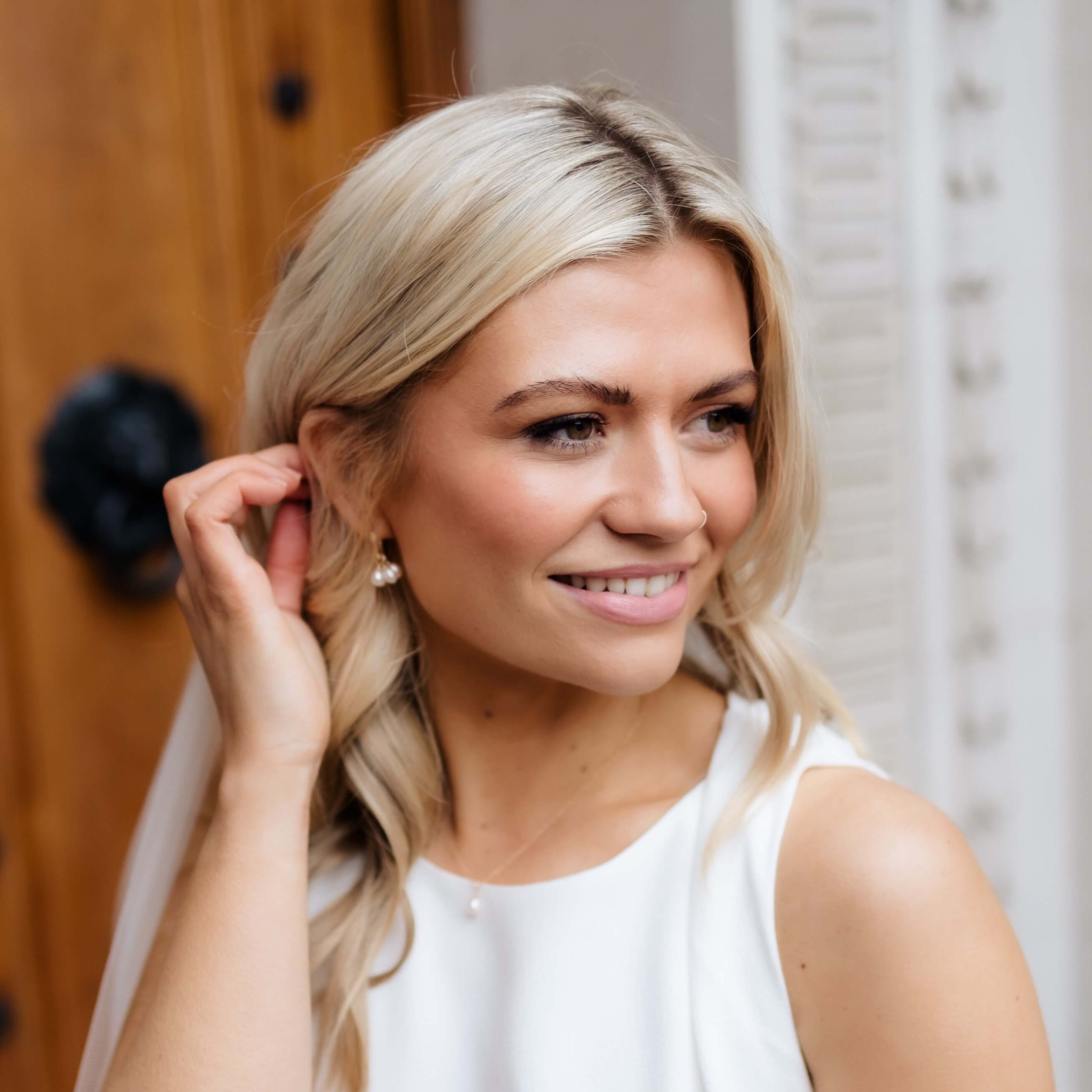 pearl earrings in gold filled on model