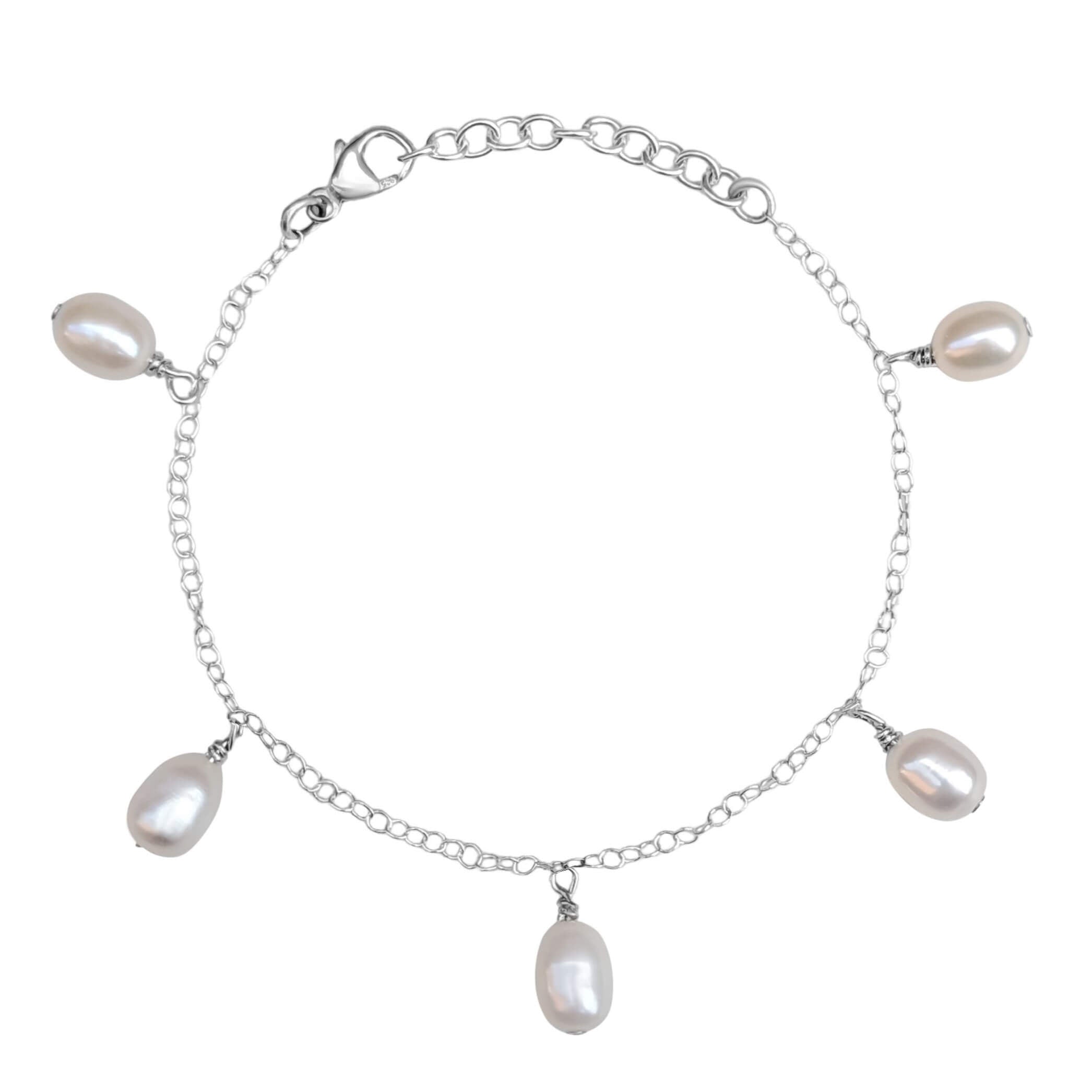 pearl drop charm bracelet in sterling silver on white background