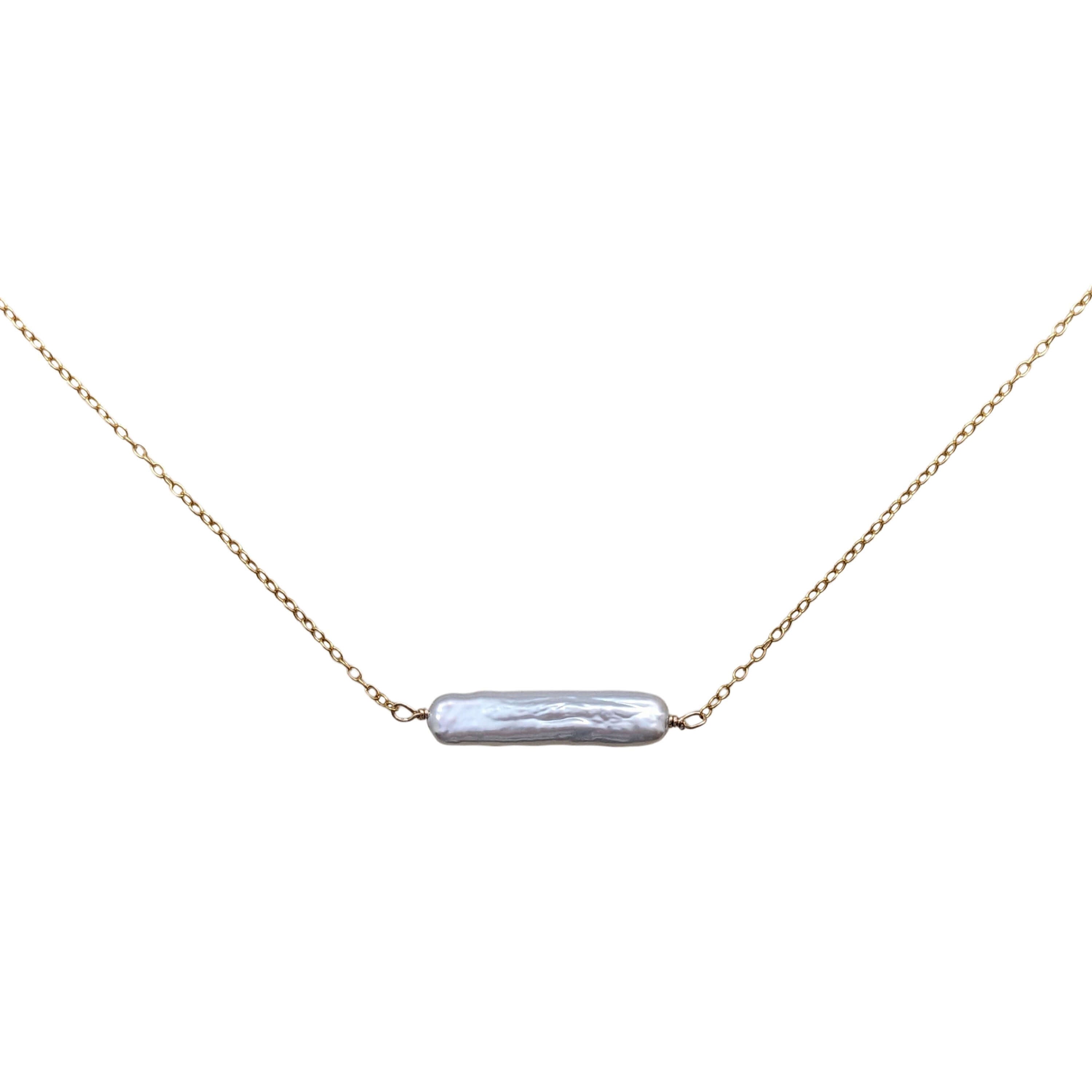 biwa pearl on a gold filled chain on a white background