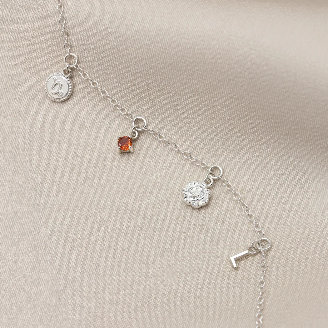 January Birthday Symbols Charm Bracelet