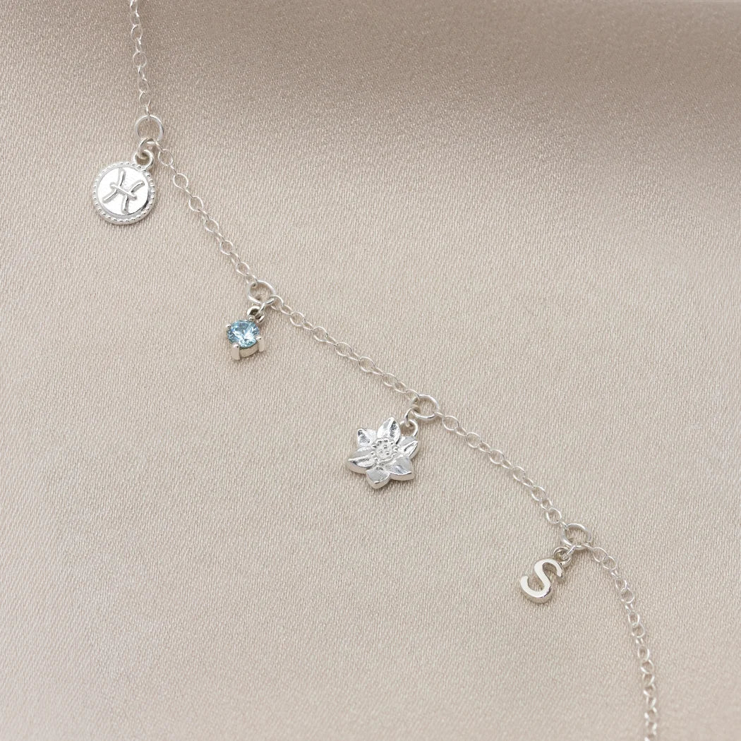 March Birthday Symbols Charm Bracelet
