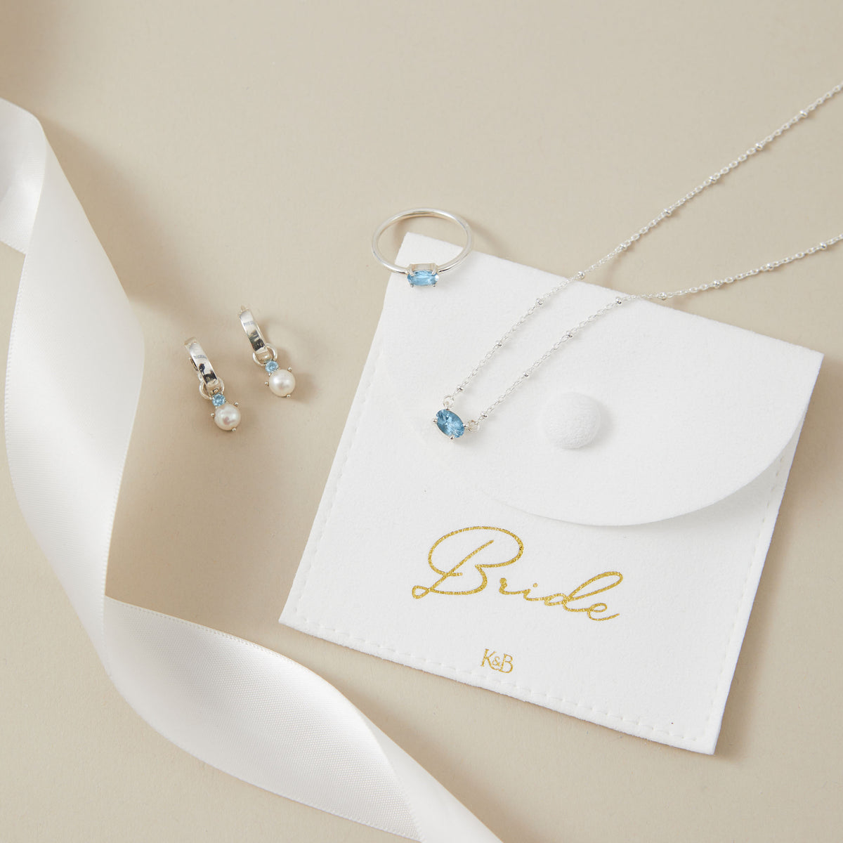 Something Blue Pearl Huggy Hoops