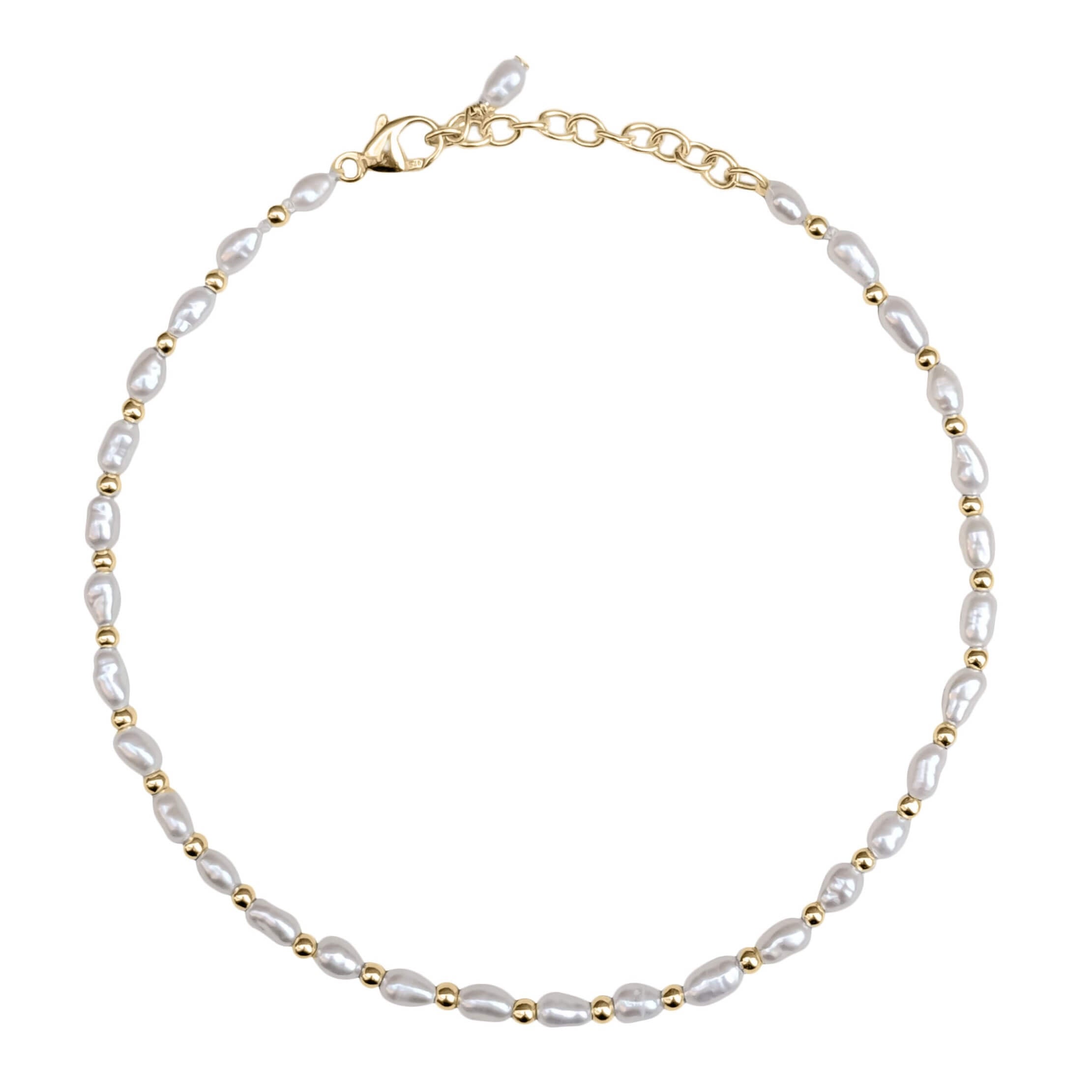 tiny pearl and gold filled bead bracelet on white background