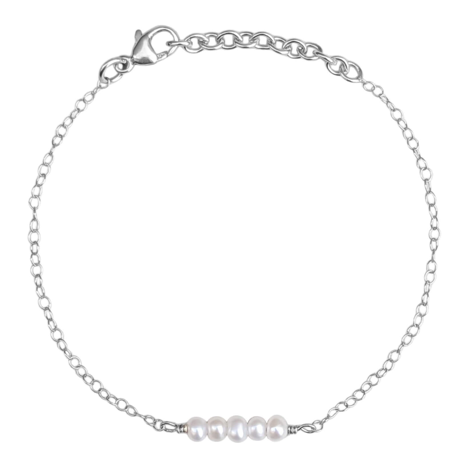 tiny pearl bar bracelet in sterling silver on white background