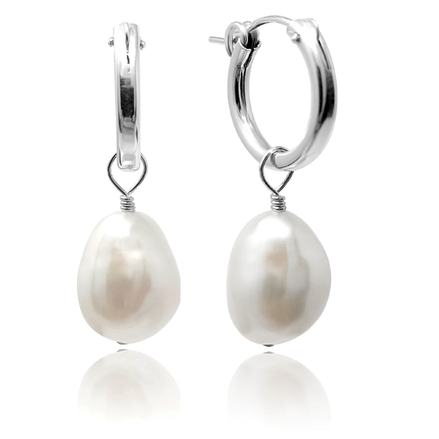 Silver hoop earring with baroque pearl pendant on white background