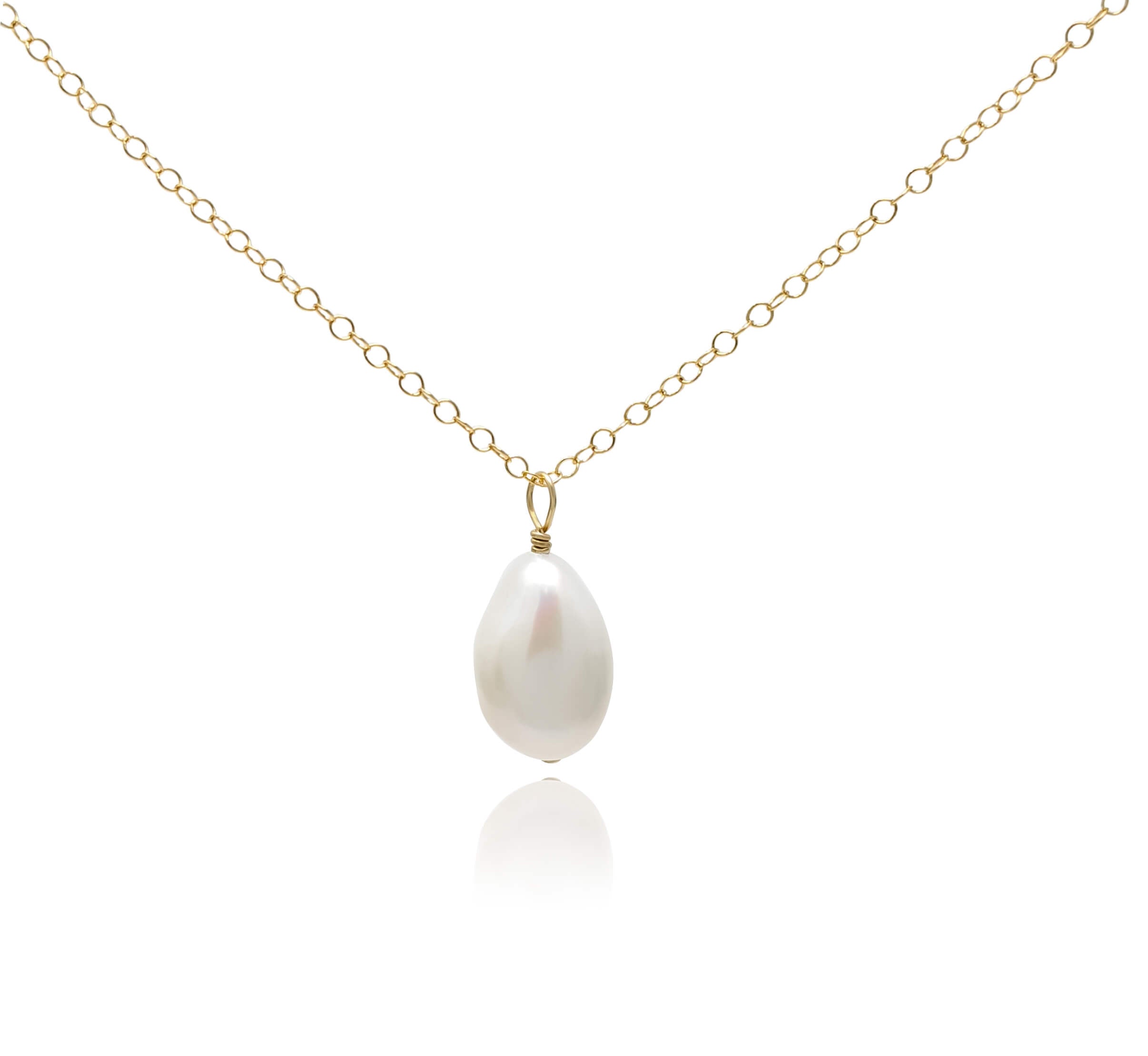 White pearl pendant necklace on gold filled chain