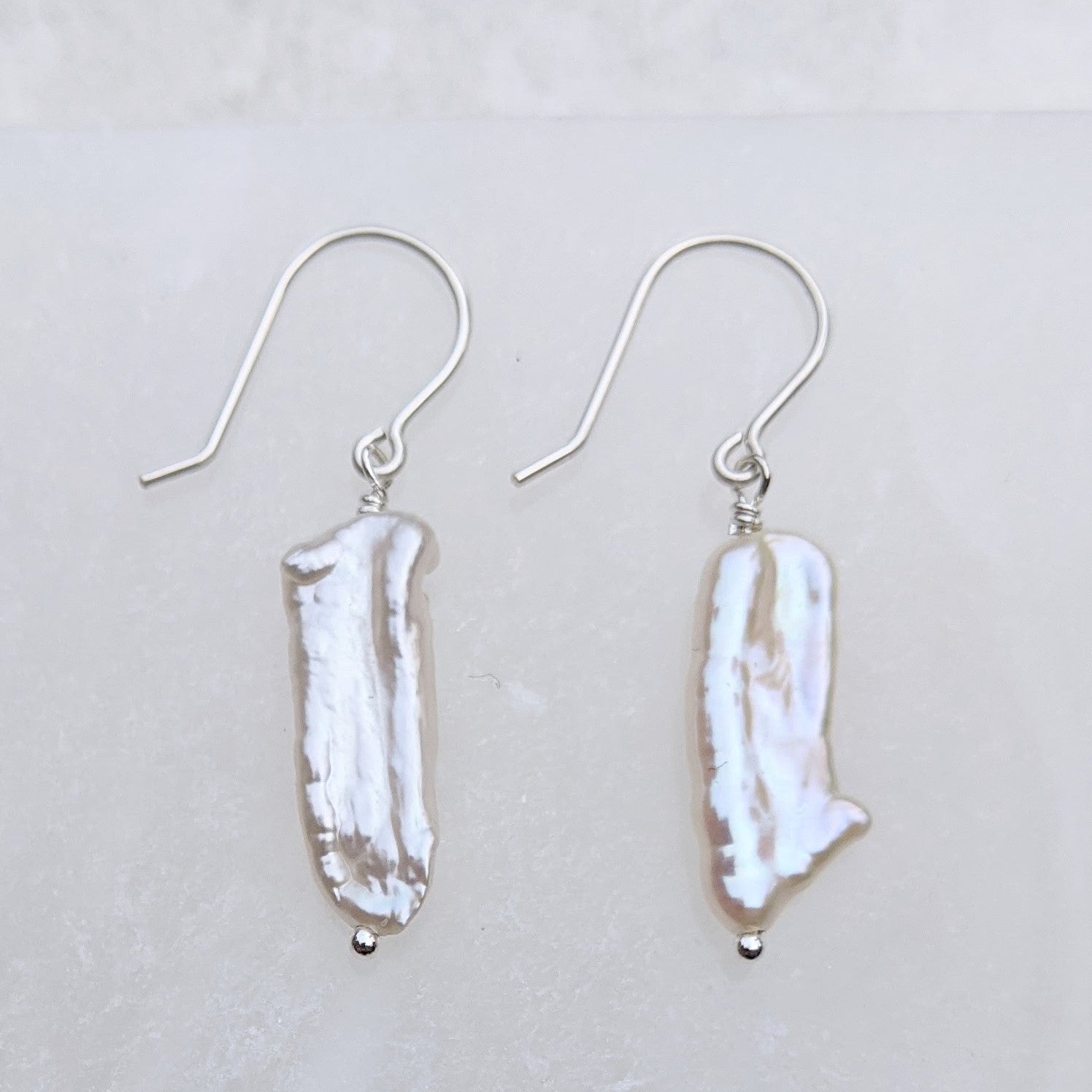 Biwa pearl earrings made with a sterling silver hook 