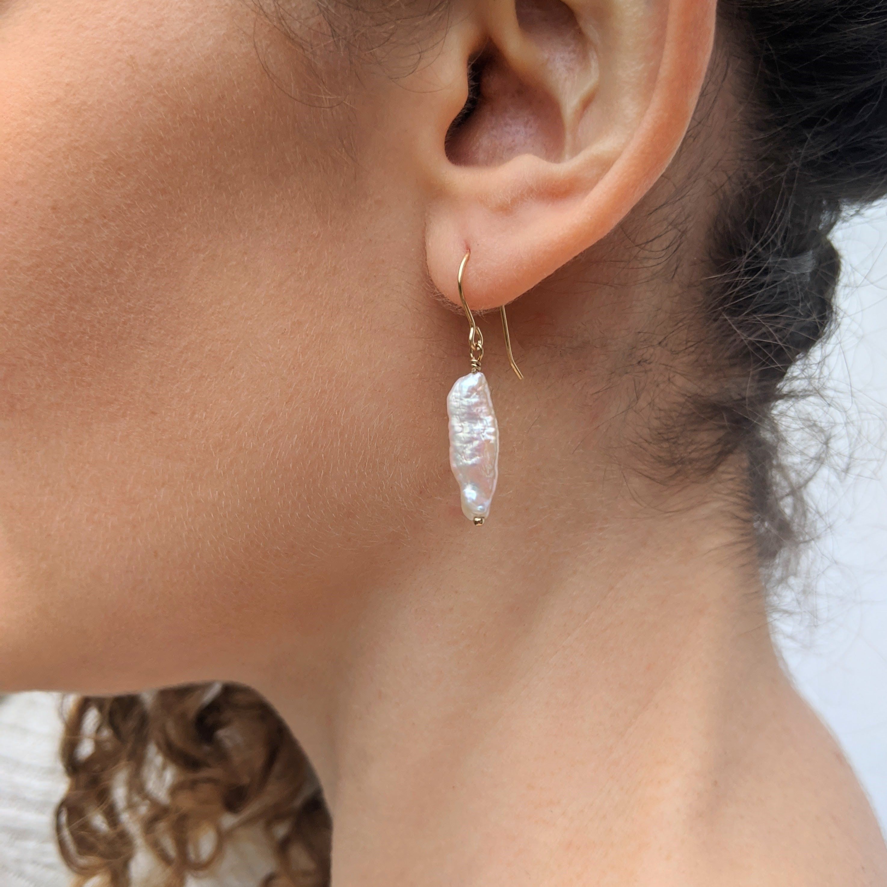 Biwa stick pearl hook earrings model closeup
