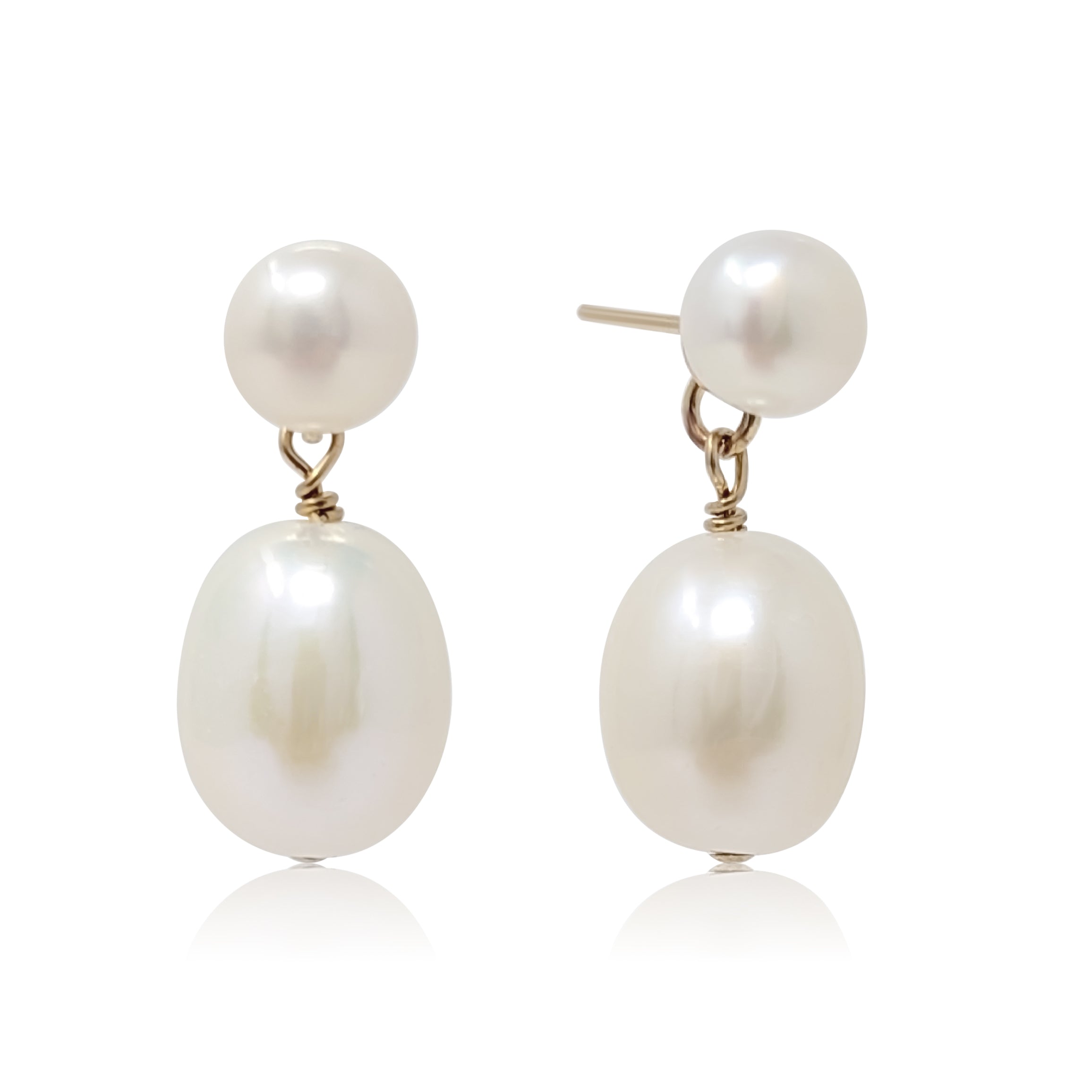 Gold filled pearl drop stud earrings on white background