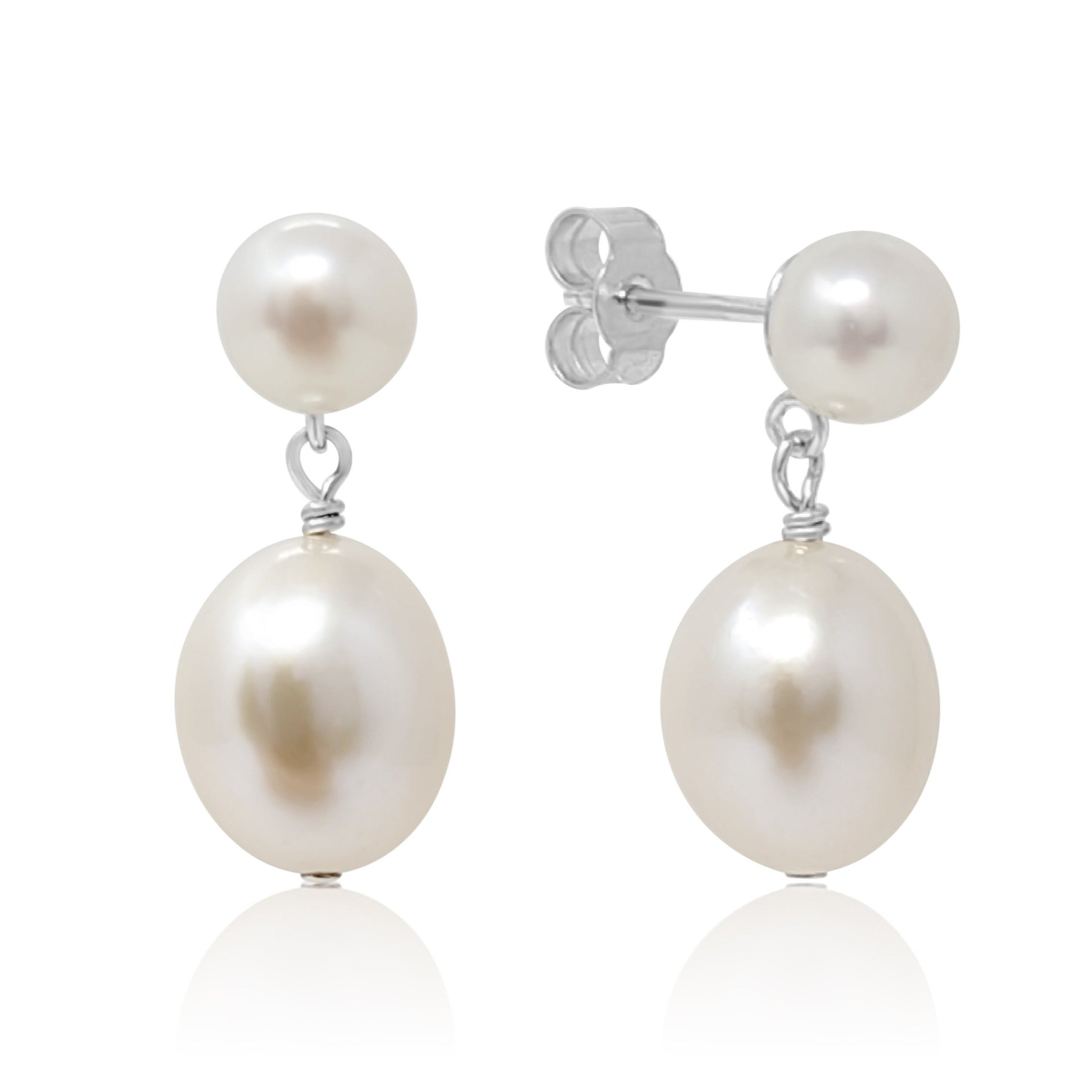 Sterling silver pearl drop studs on white background