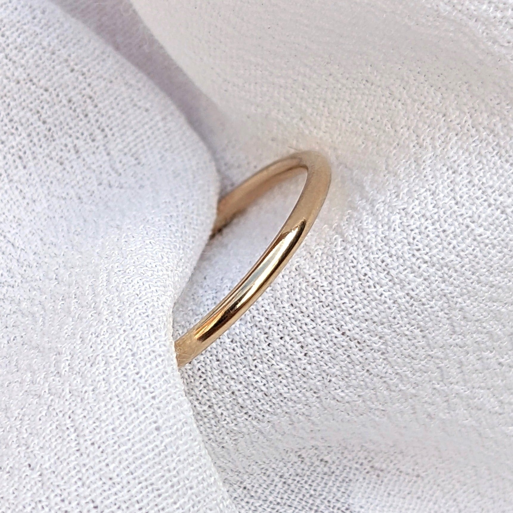 Slim gold filled ring in white fabric