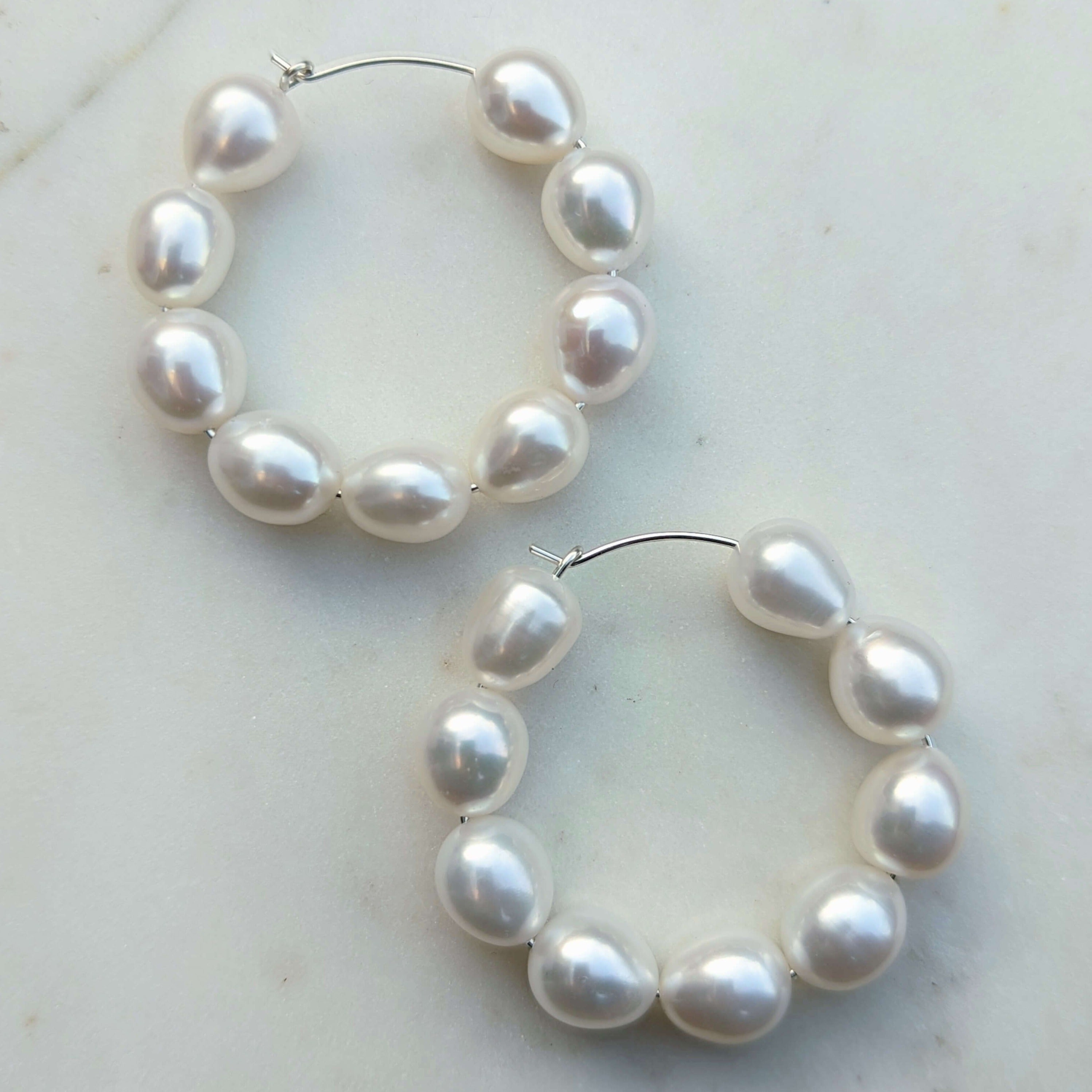 pearl hoop wire earrings in sterling silver
