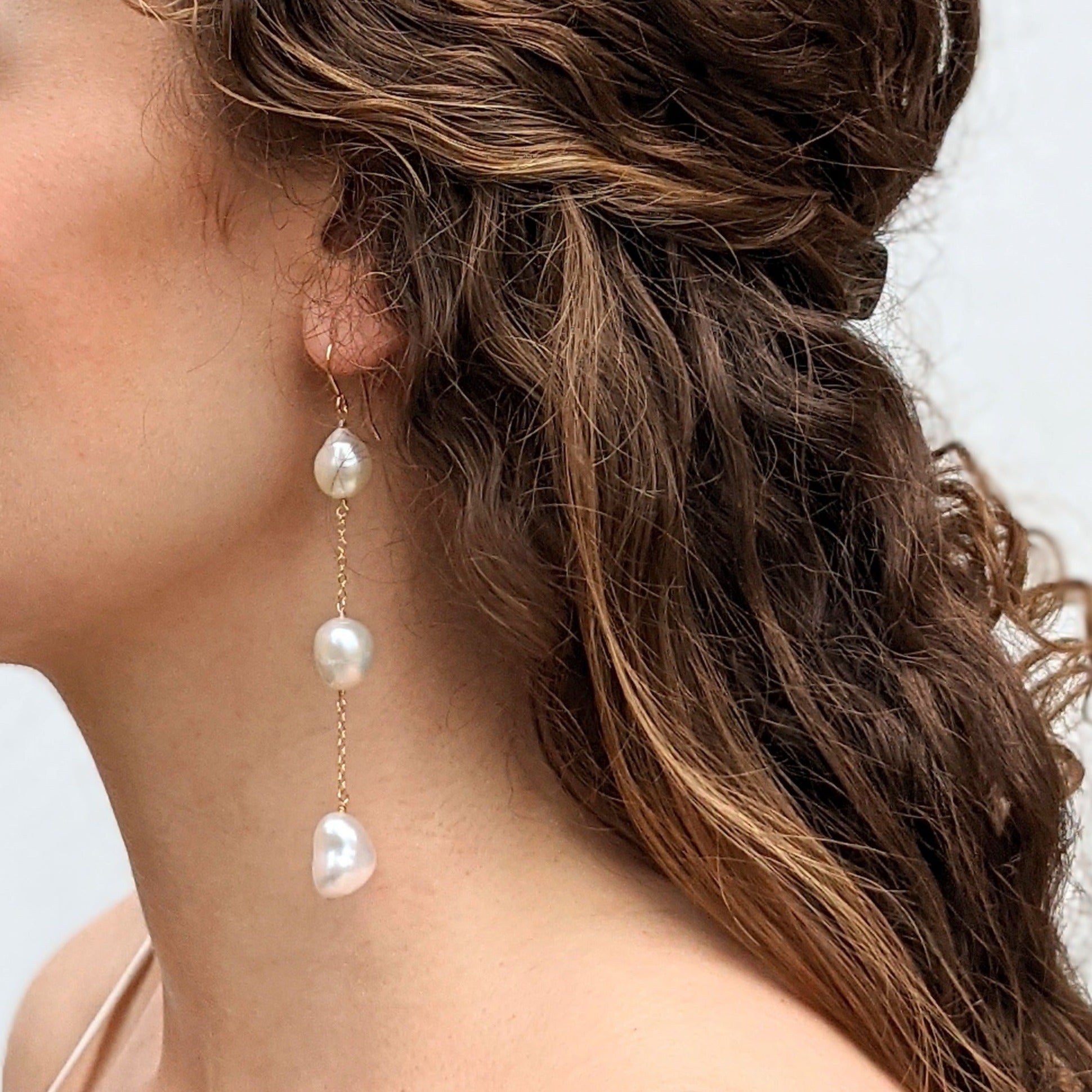 Long drop pearl earrings model