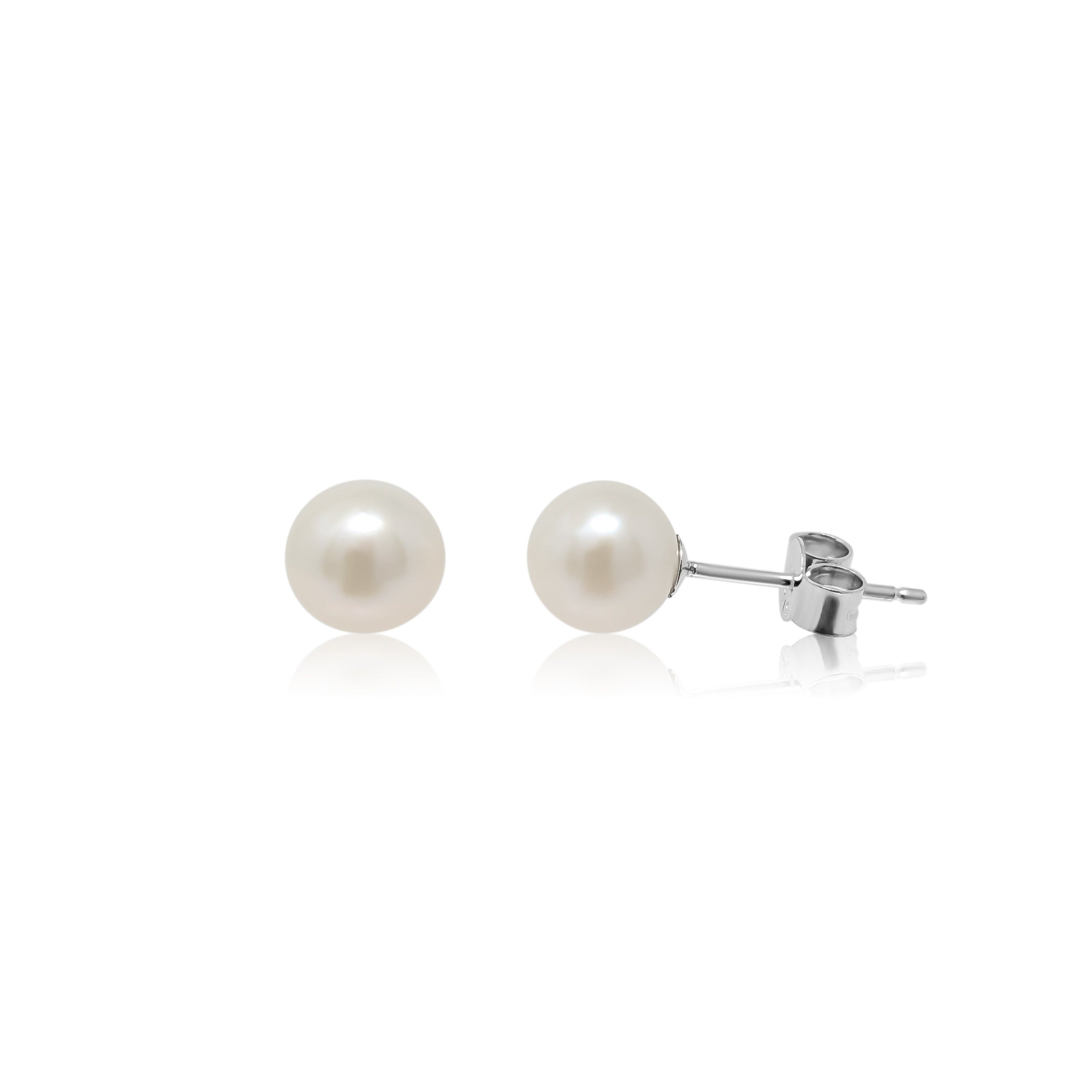 Sterling silver Luna stud earrings on white background
