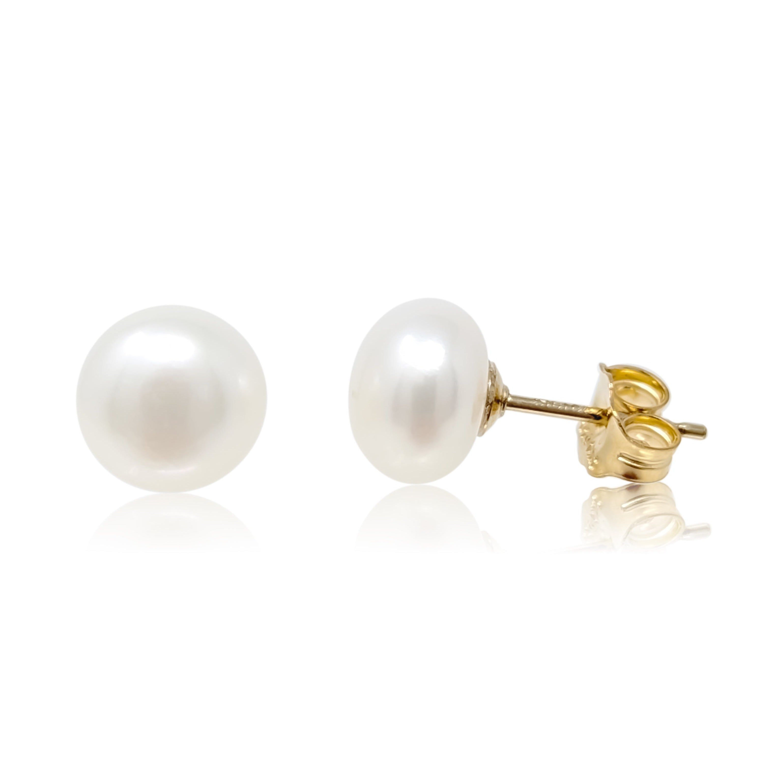 Gold filled Mae stud earrings on white background