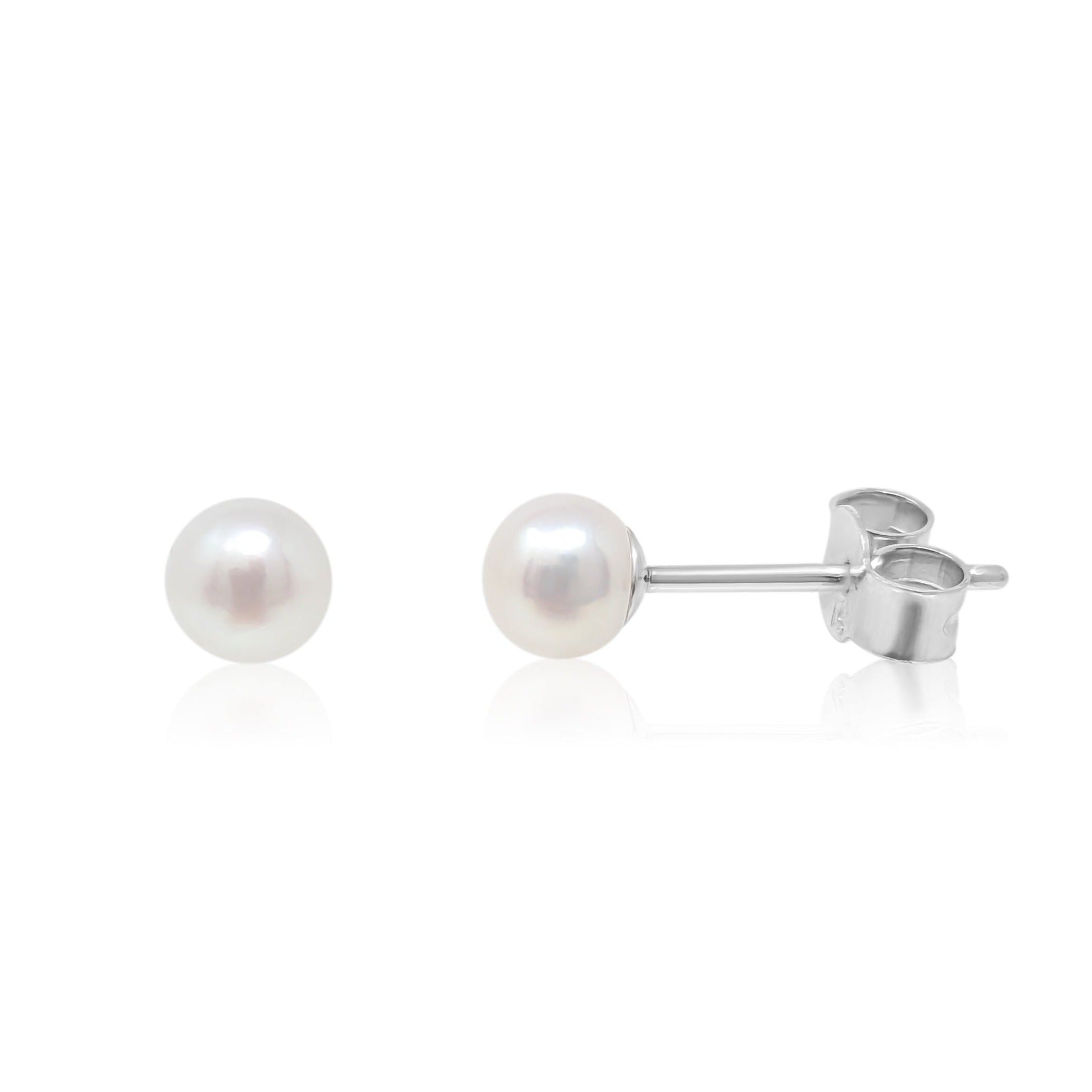 Sterling silver Mini Mae studs on white background