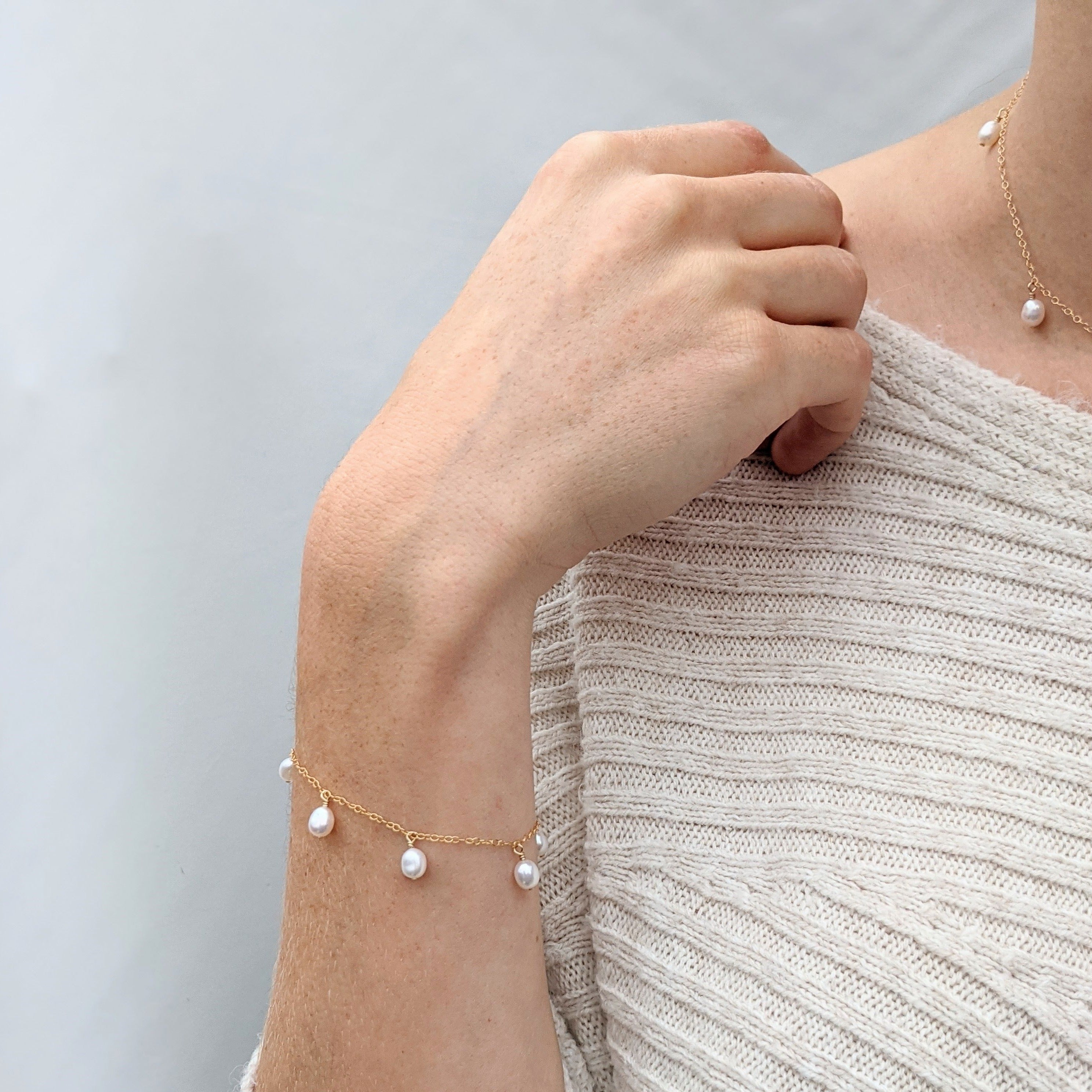 Mini Pearl Charm Bracelet on Model Wrist