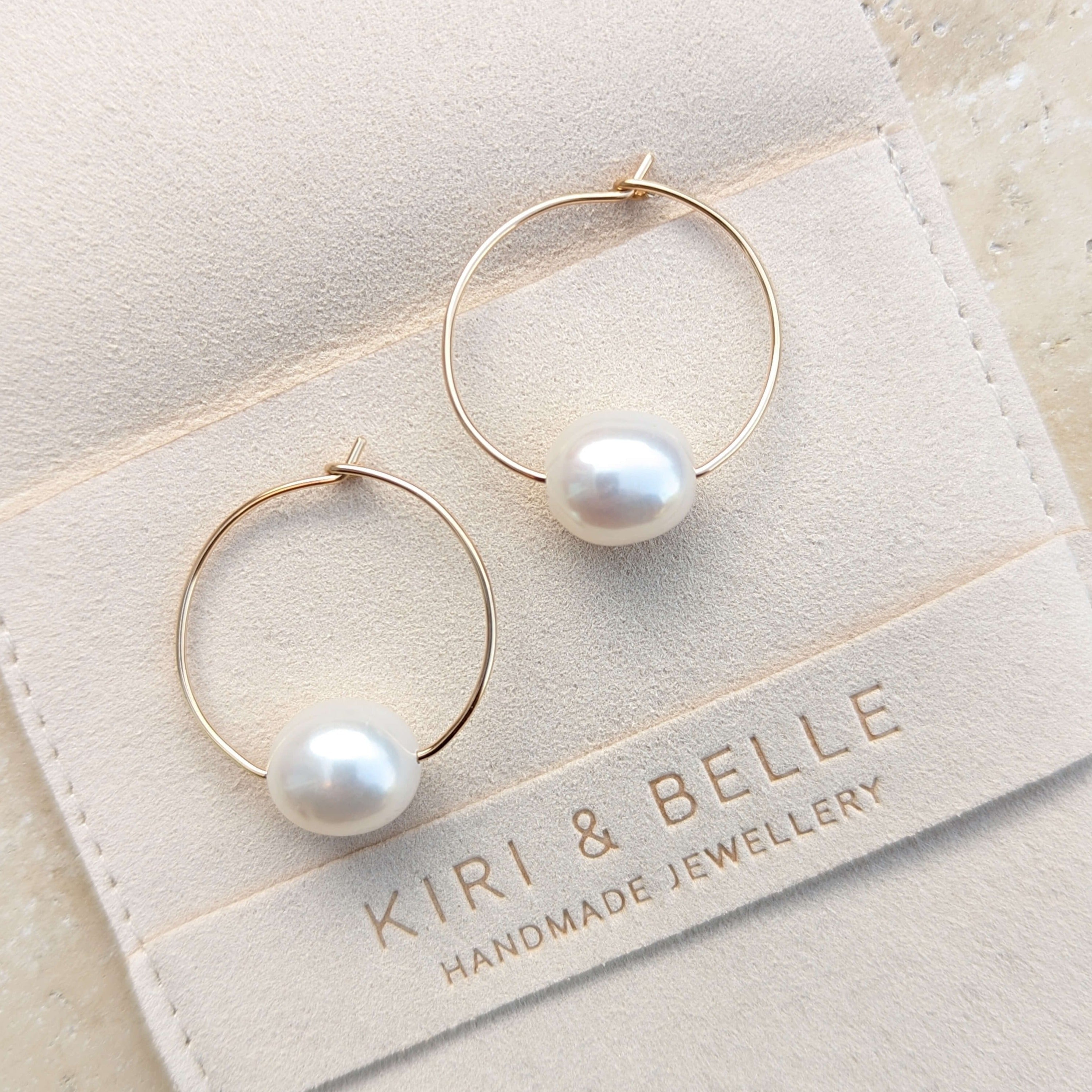 large pearl wire hoop earrings with single large baroque pearl in gold filled