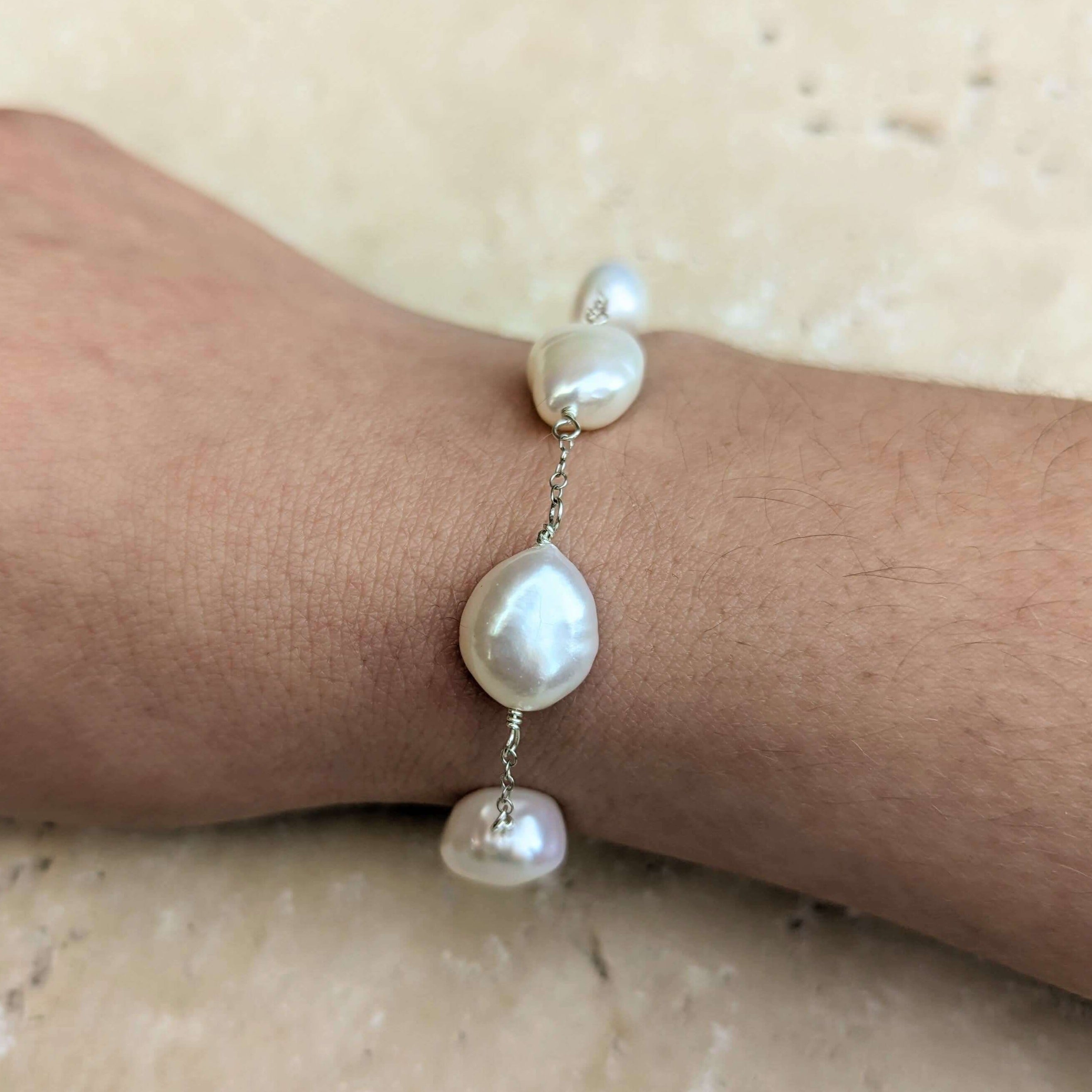 Baroque pearl chain bracelet on model in sterling silver