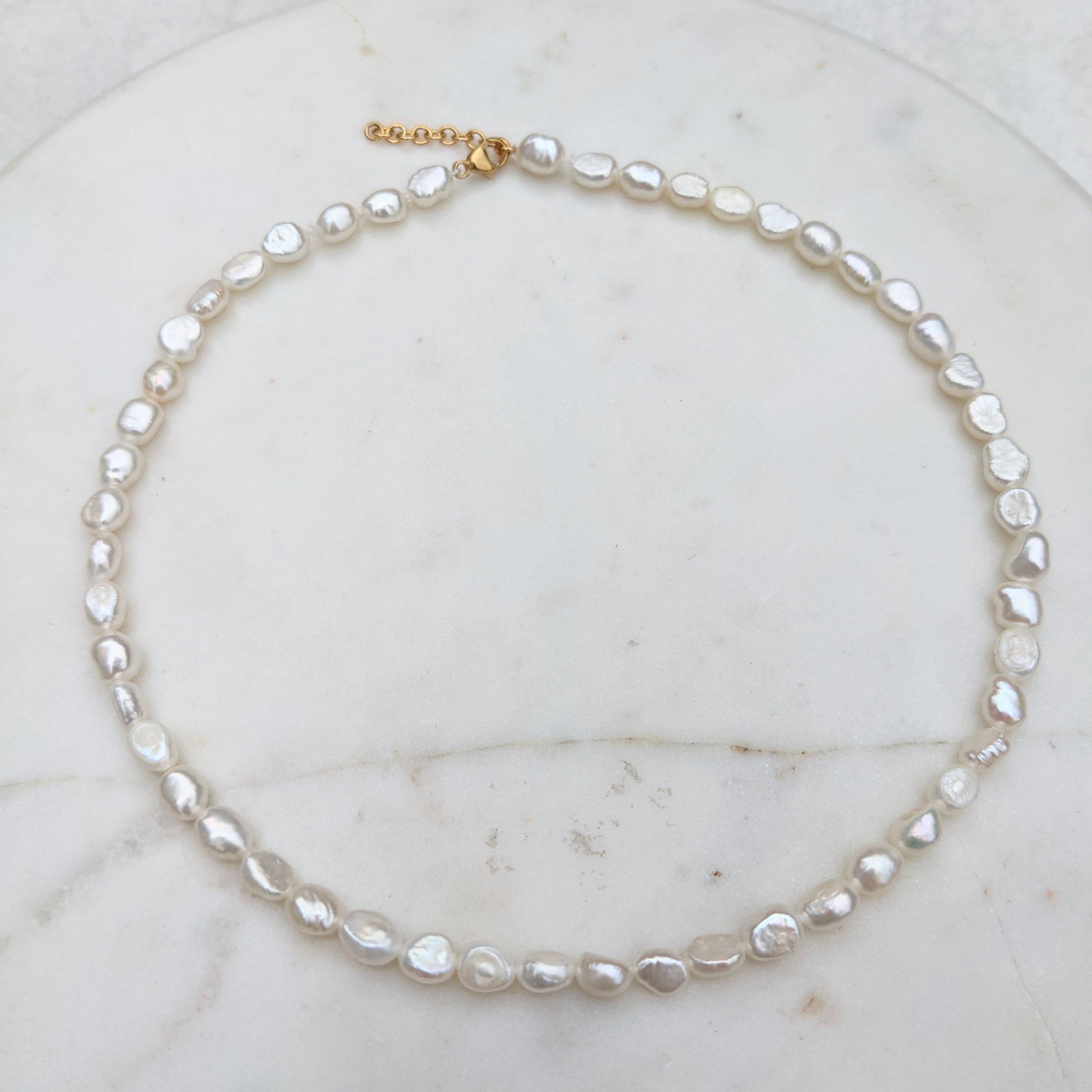 Pearl choker necklace made with small baroque irregular seed with gold filled adjustable clasp