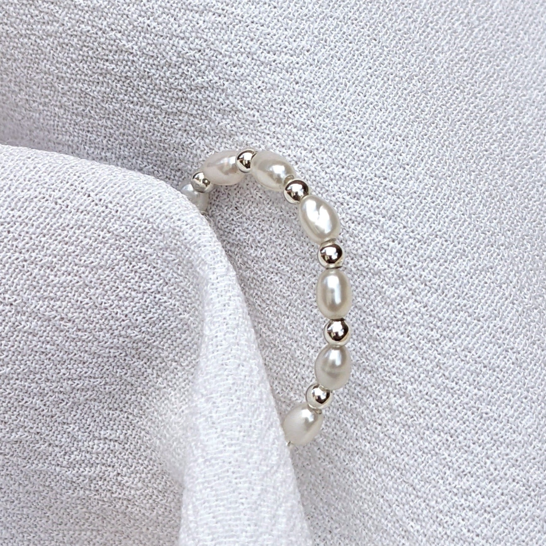 Pearl and silver bead ring