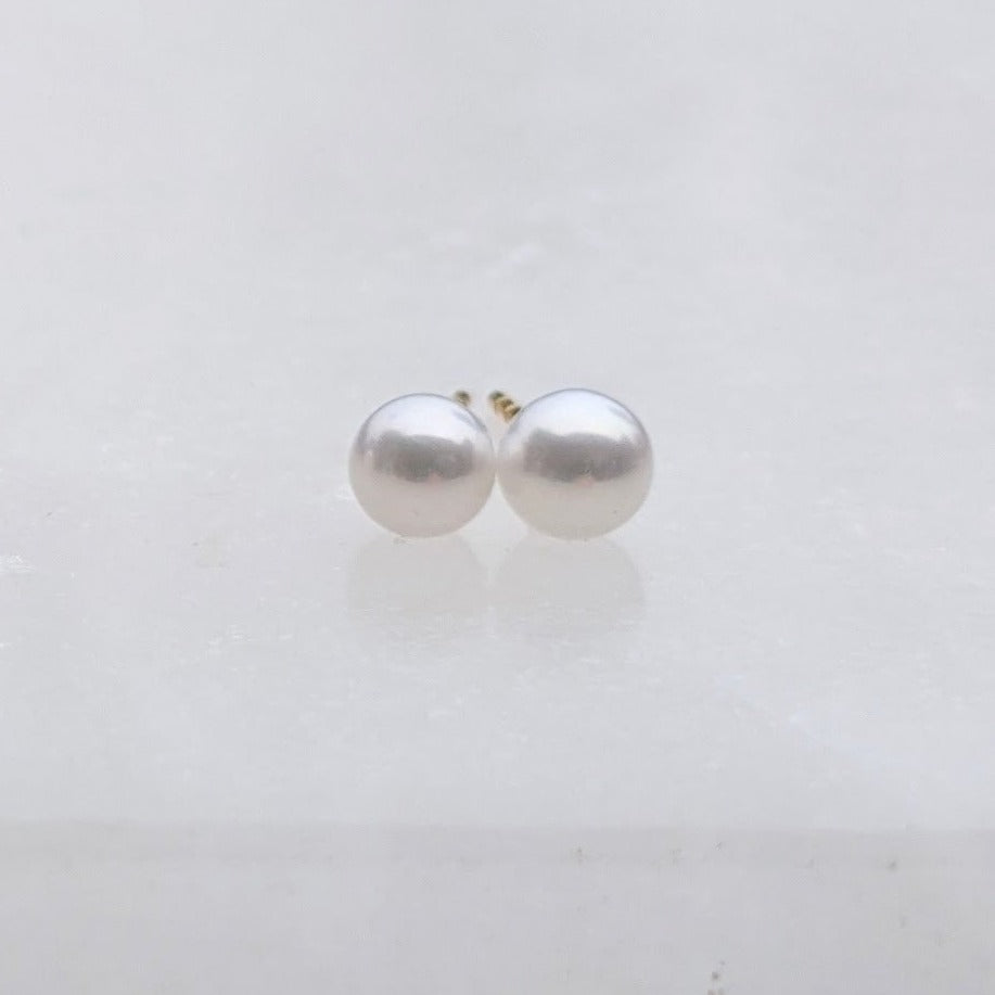 Small round pearl stud earrings