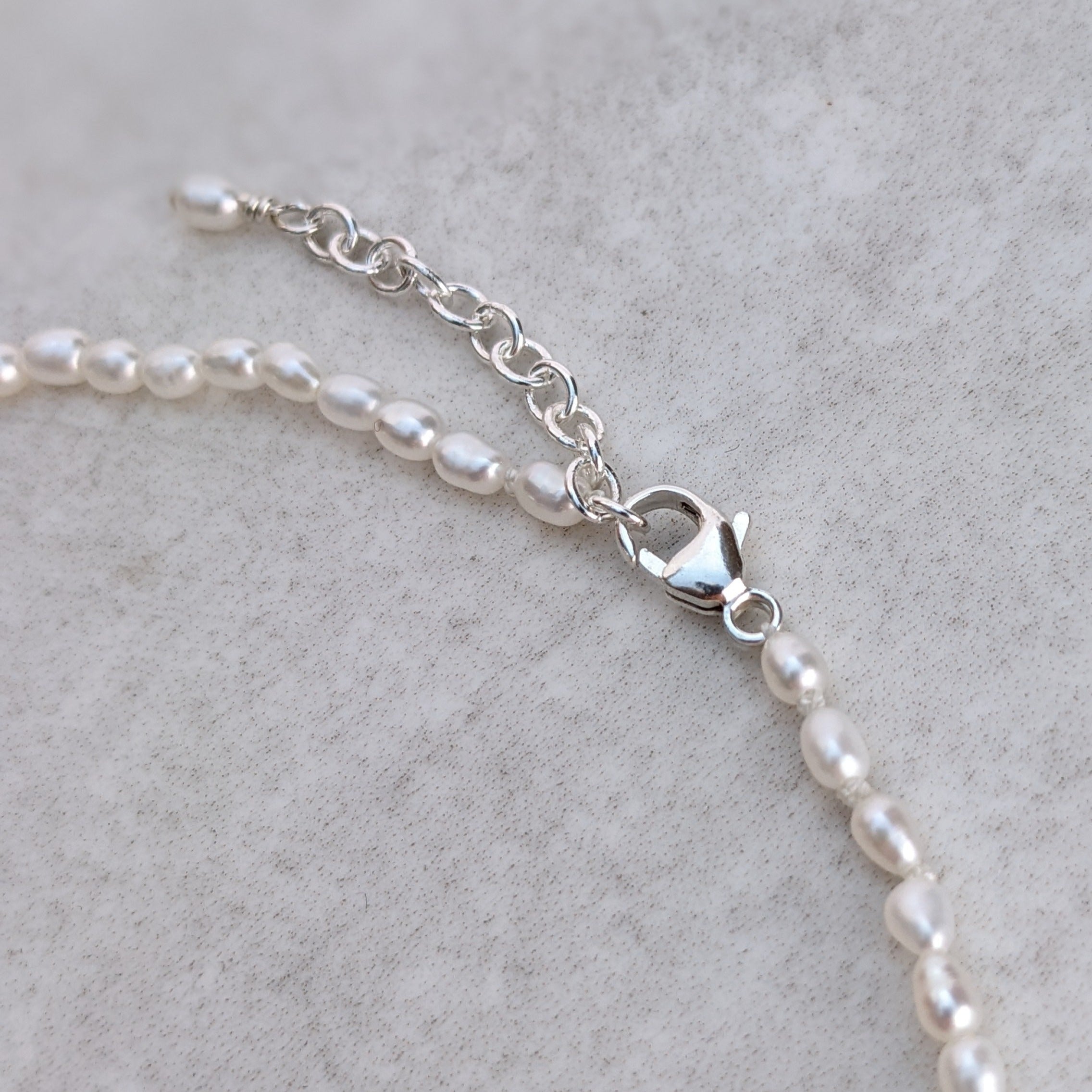 Sterling silver adjustable seed pearl bracelet