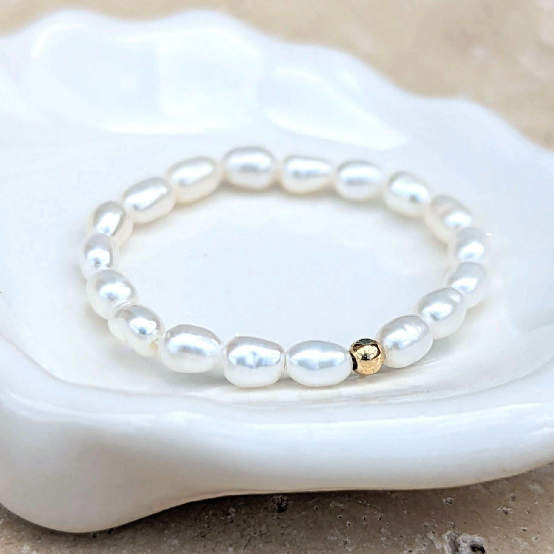 Single gold bead and pearl ring