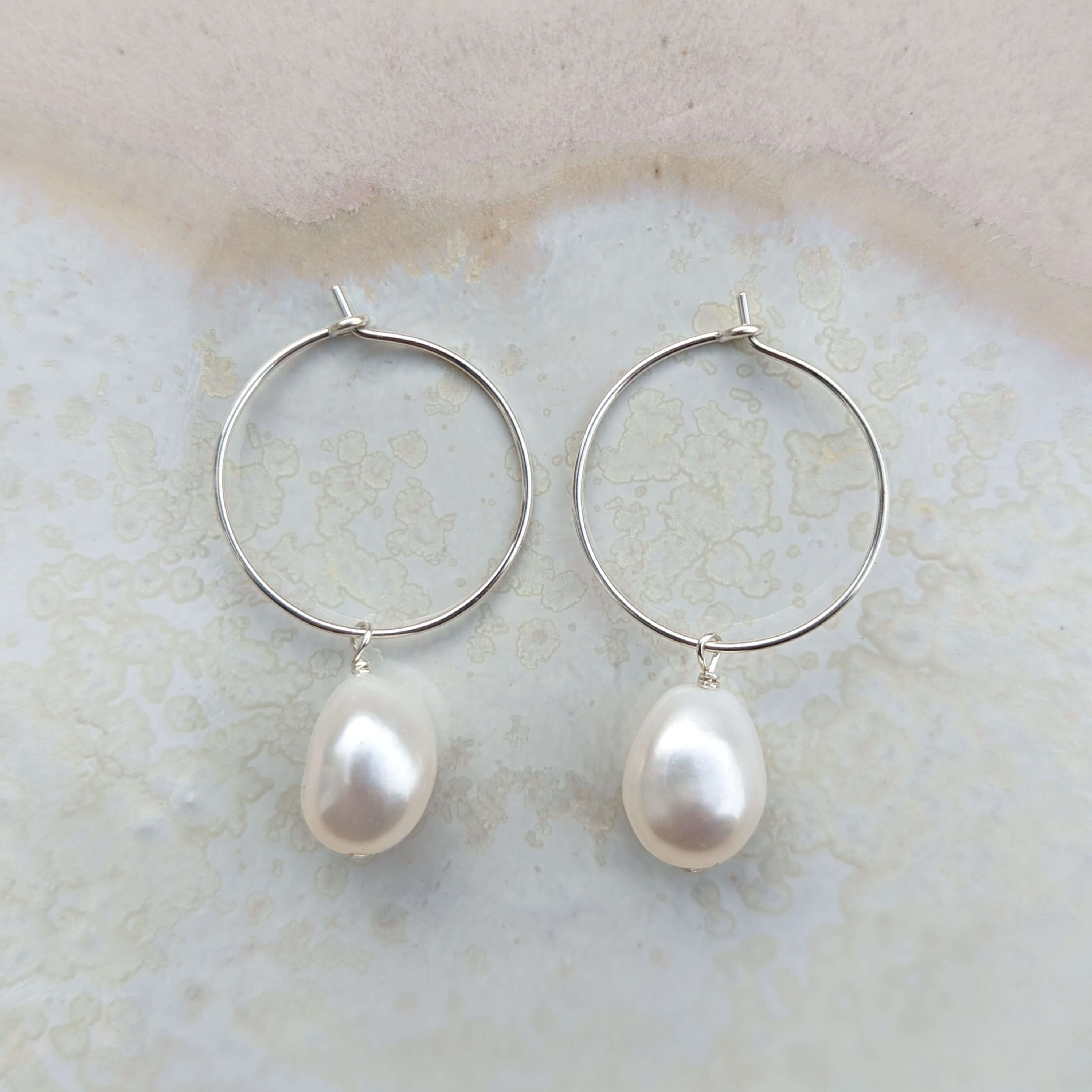 thin hoop pearl drop earrings in sterling silver