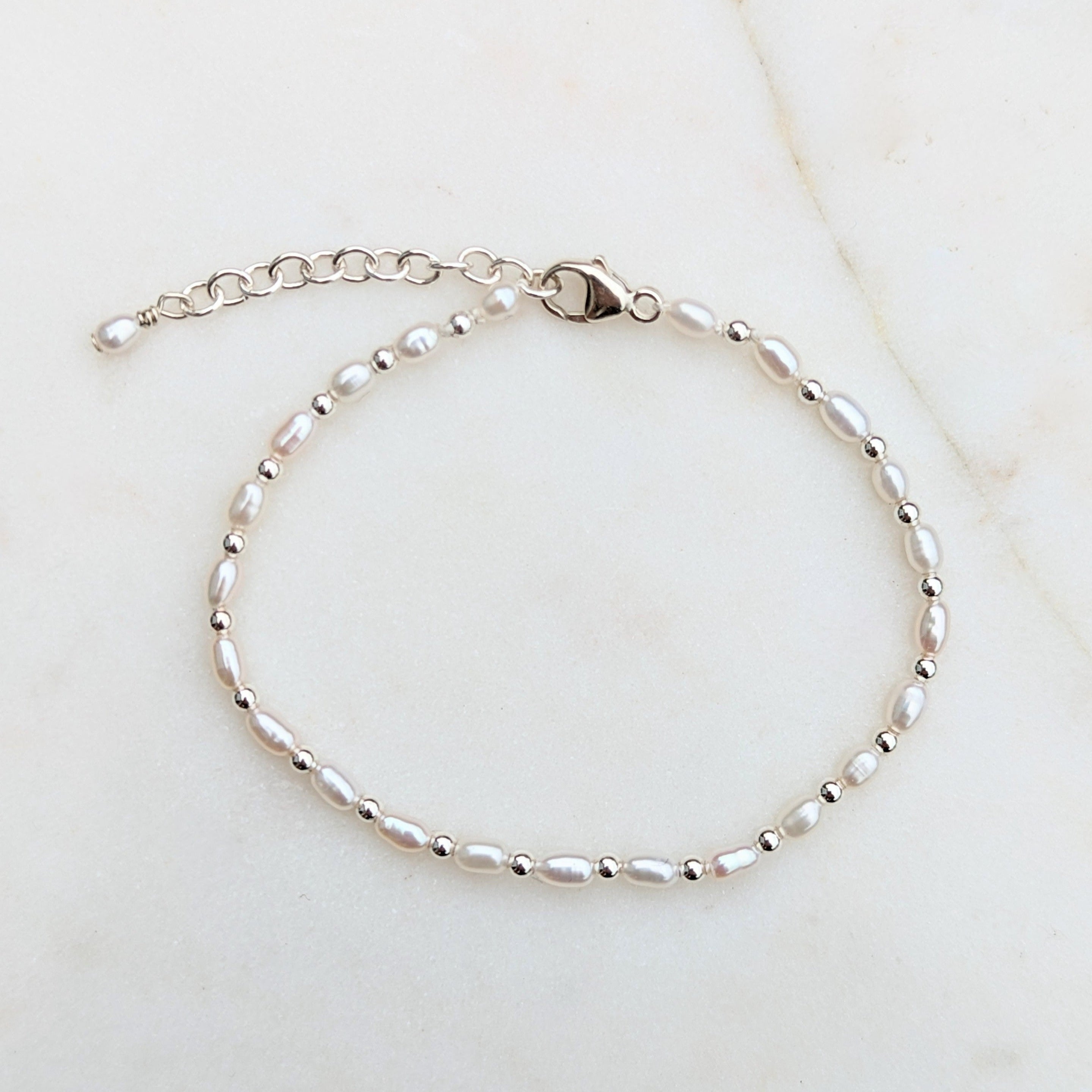 Tiny pearl and silver bead adjustable bracelet